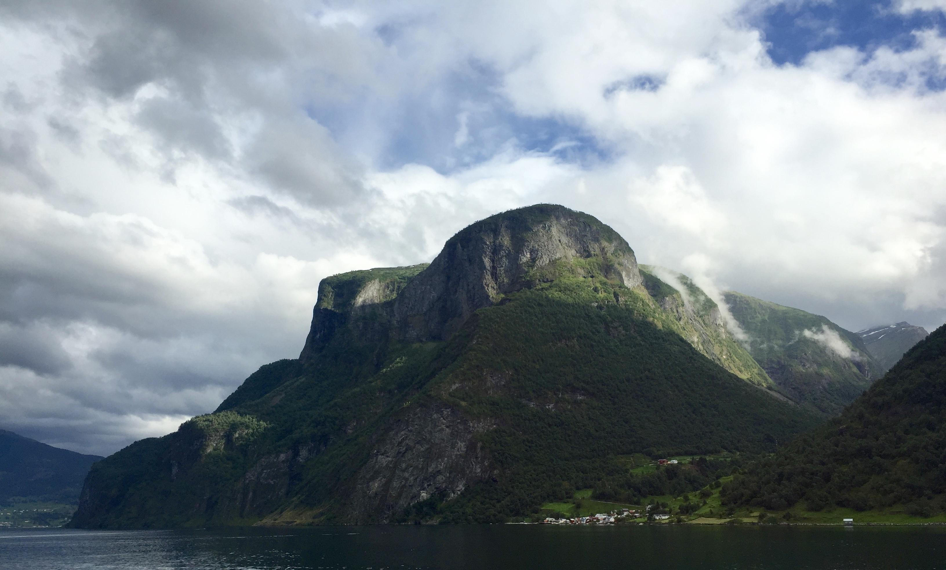 Mountains and water in a fjord landscape HD Wallpaper