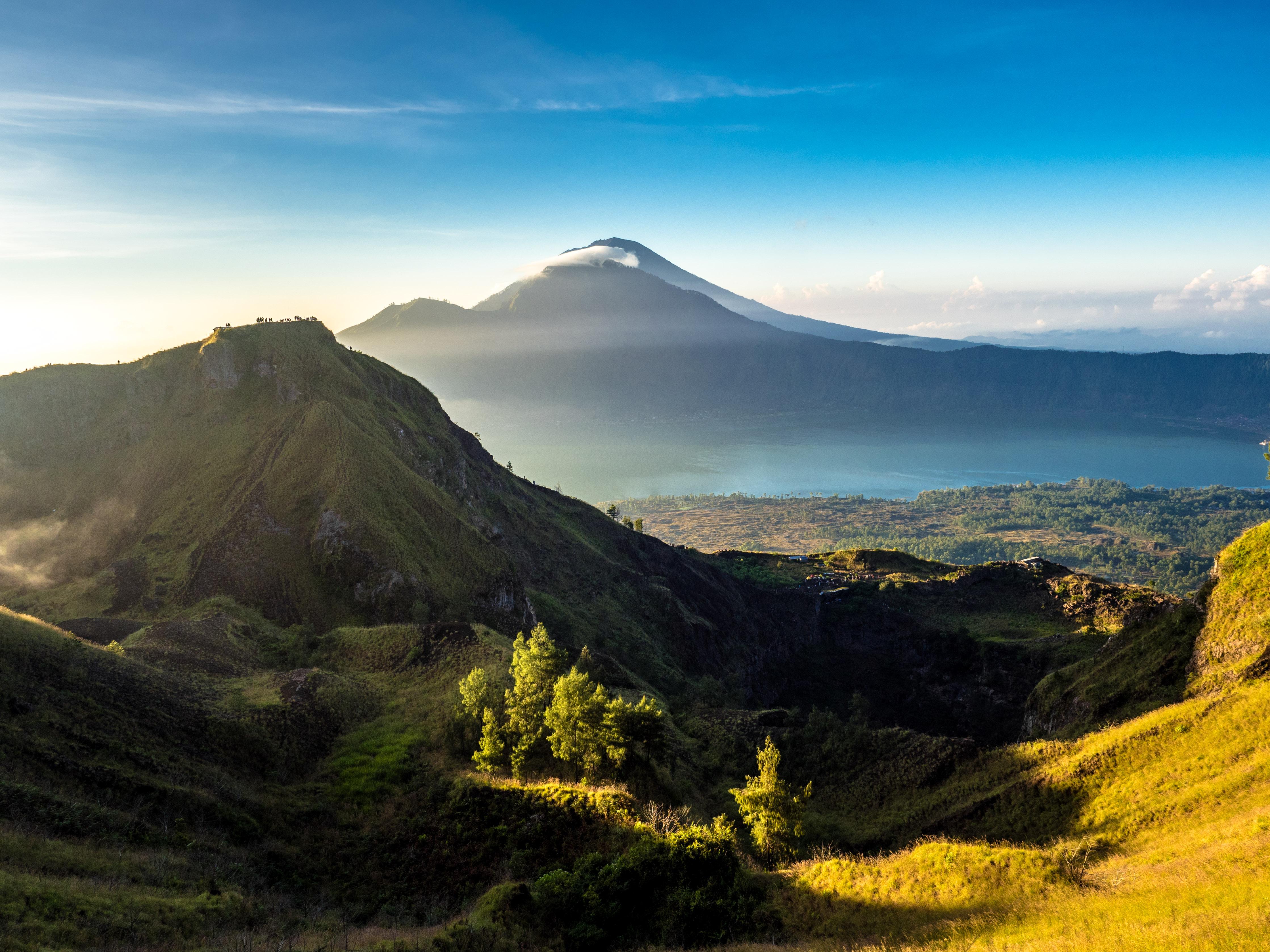 Volcanic landscape with mountains and lake at sunrise HD Wallpaper