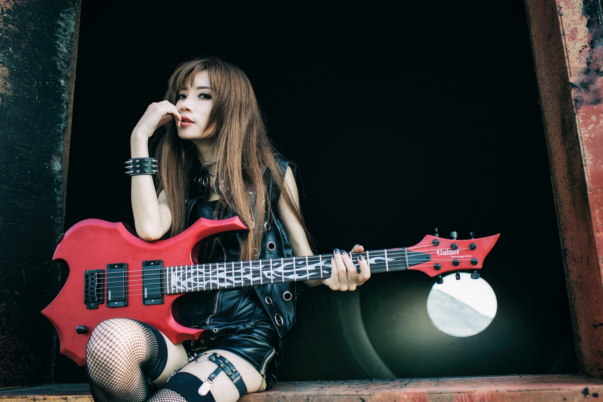 Asian woman with red electric guitar HD Wallpaper