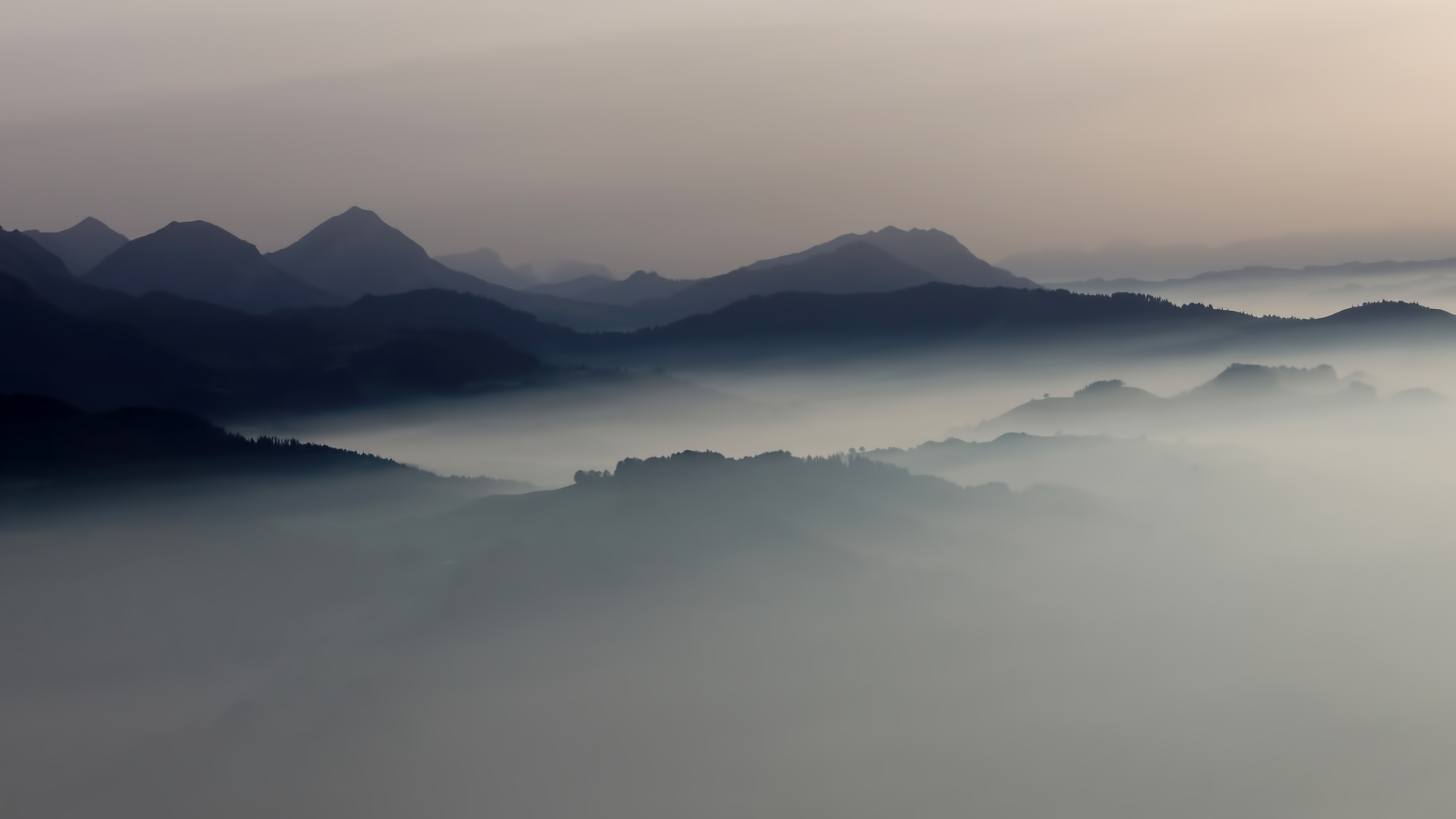 Misty mountains at sunrise HD Wallpaper