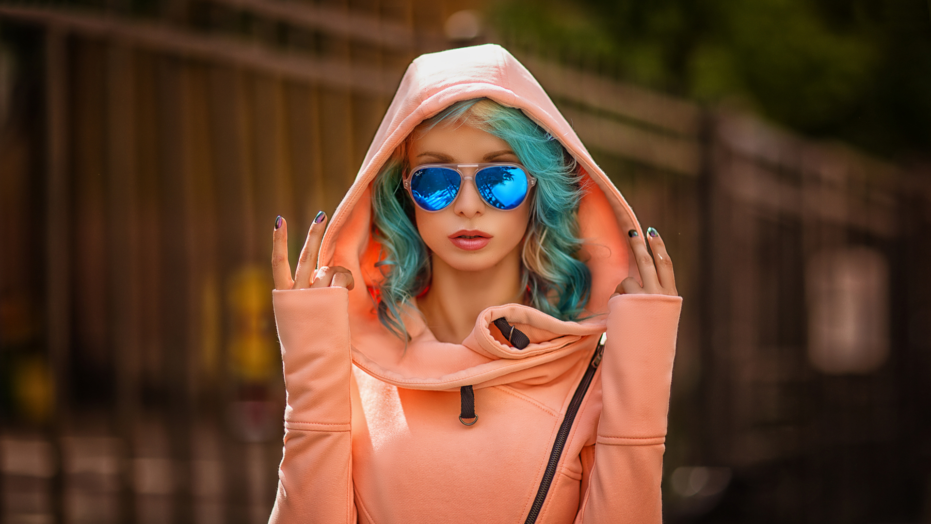 Woman with blue dyed hair wearing sunglasses and a hoodie HD Wallpaper