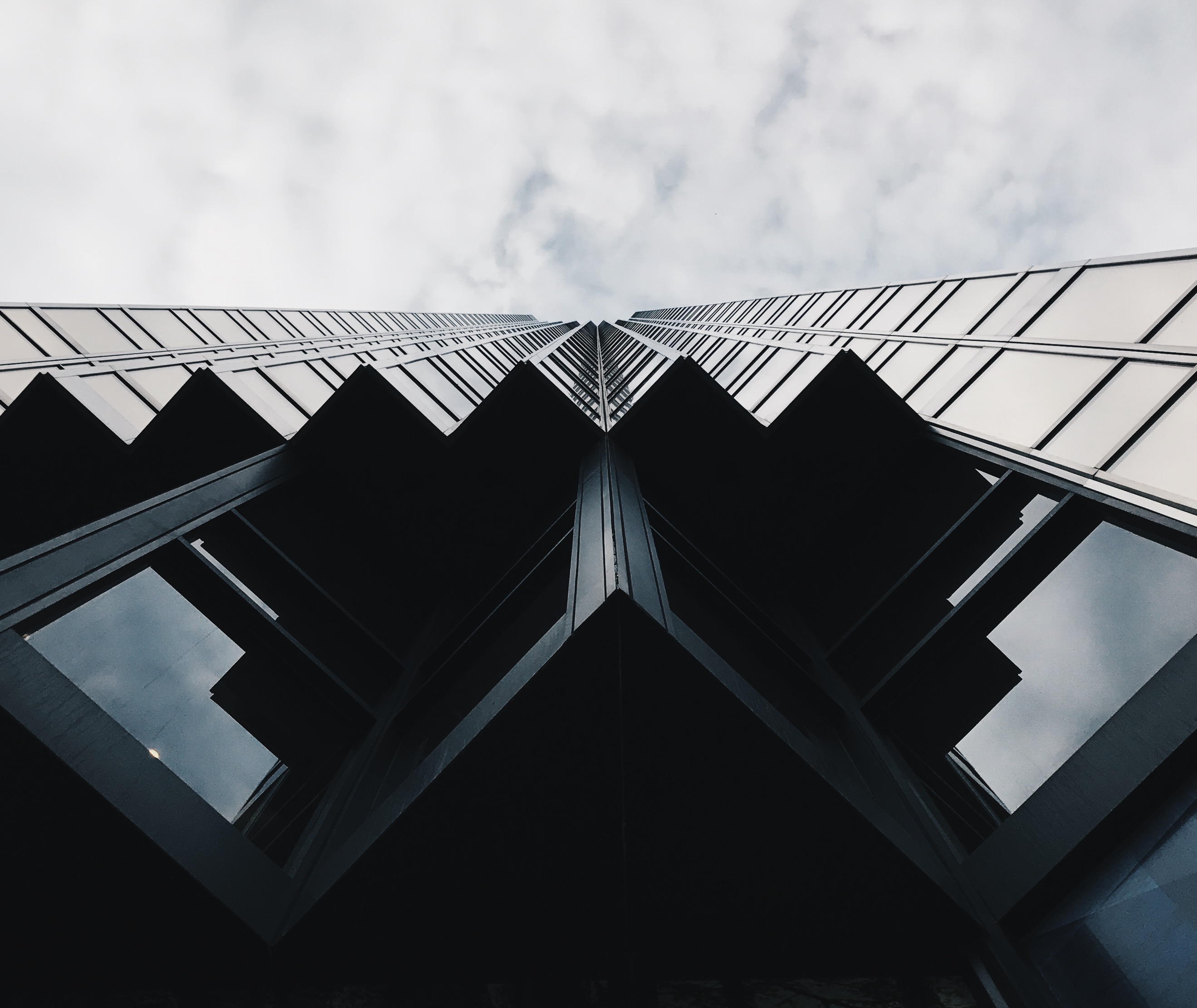 Low angle view of a modern skyscraper HD Wallpaper