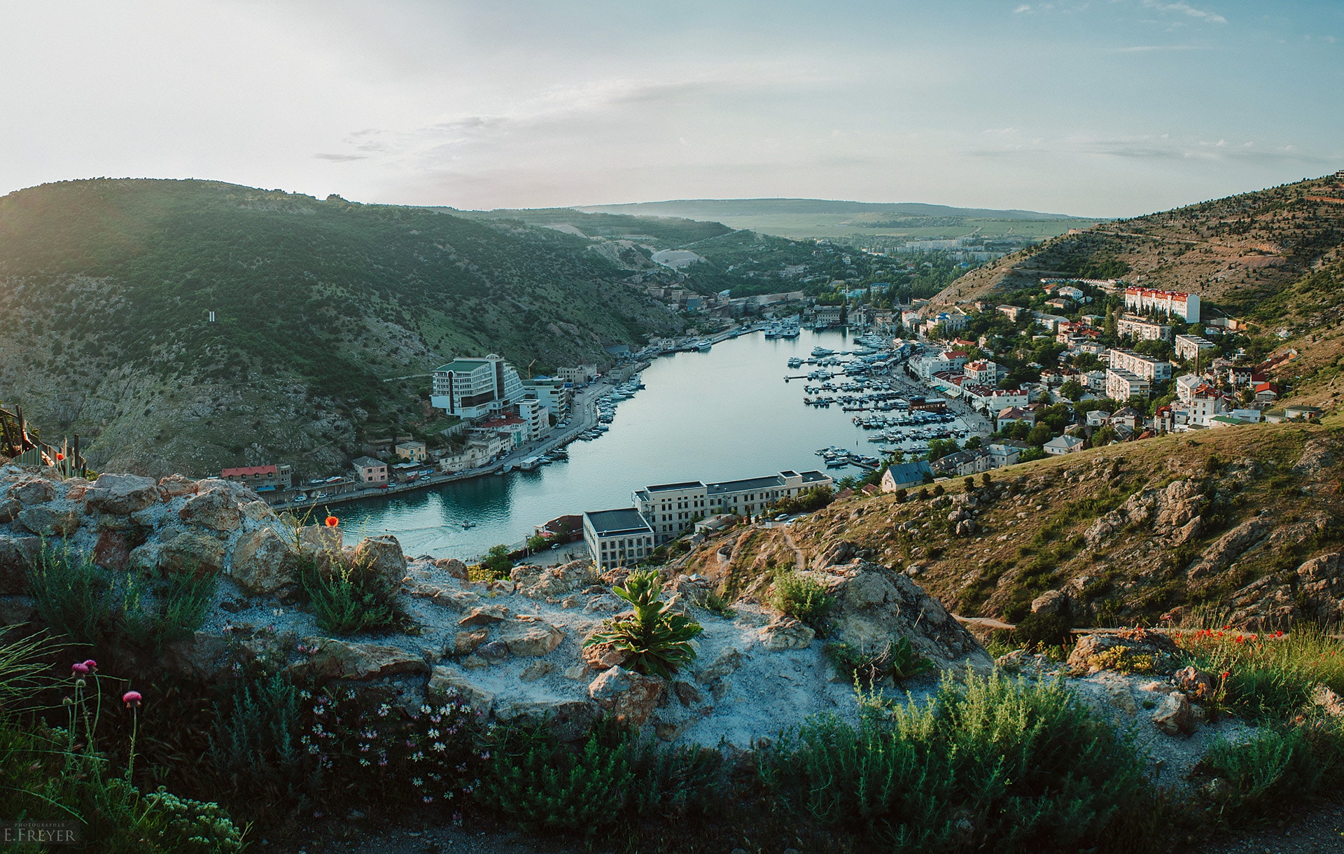 Balaklava Bay with yachts and buildings on hills HD Wallpaper
