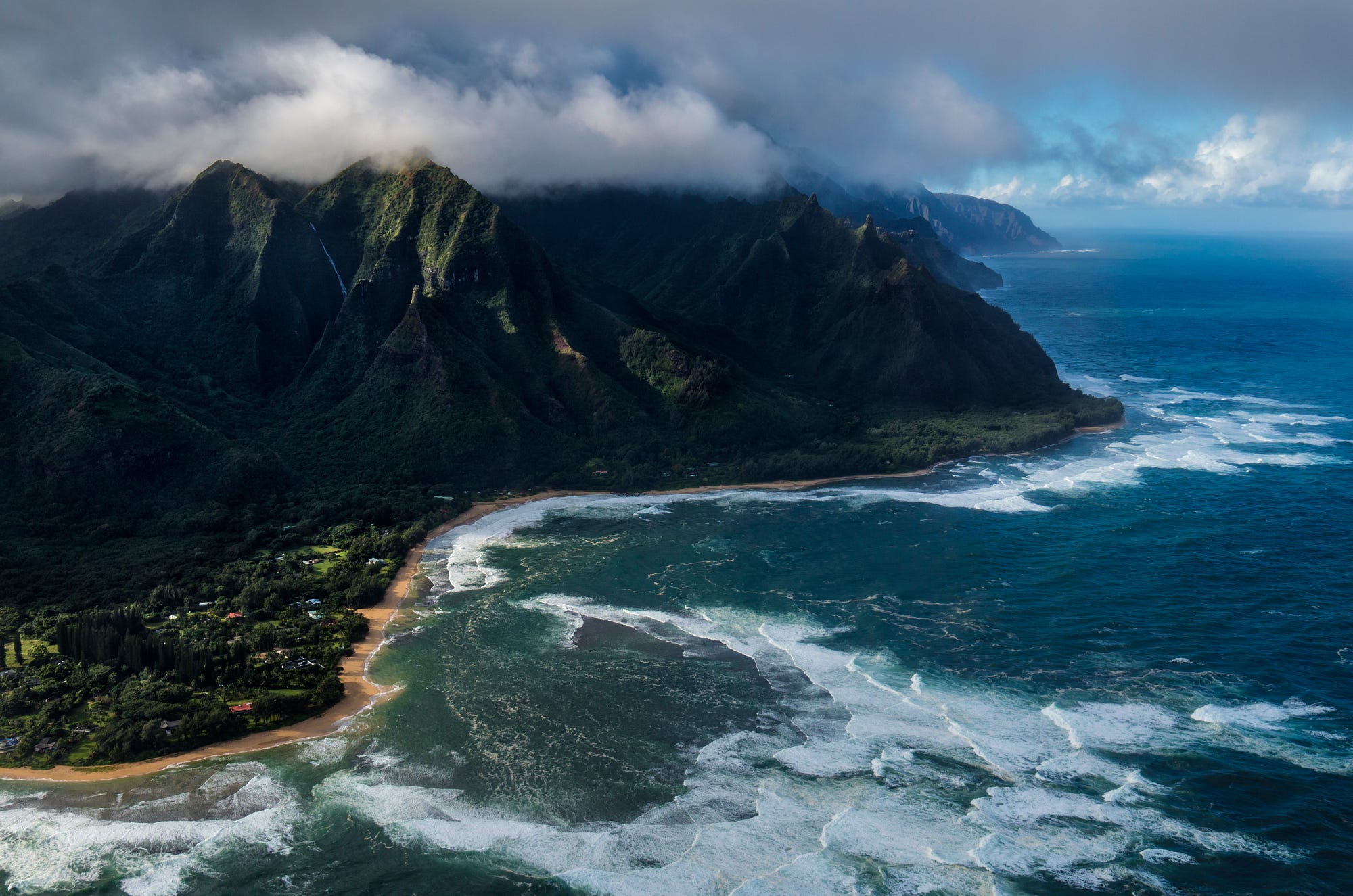 Aerial view of mountains and coastline in Hawaii HD Wallpaper