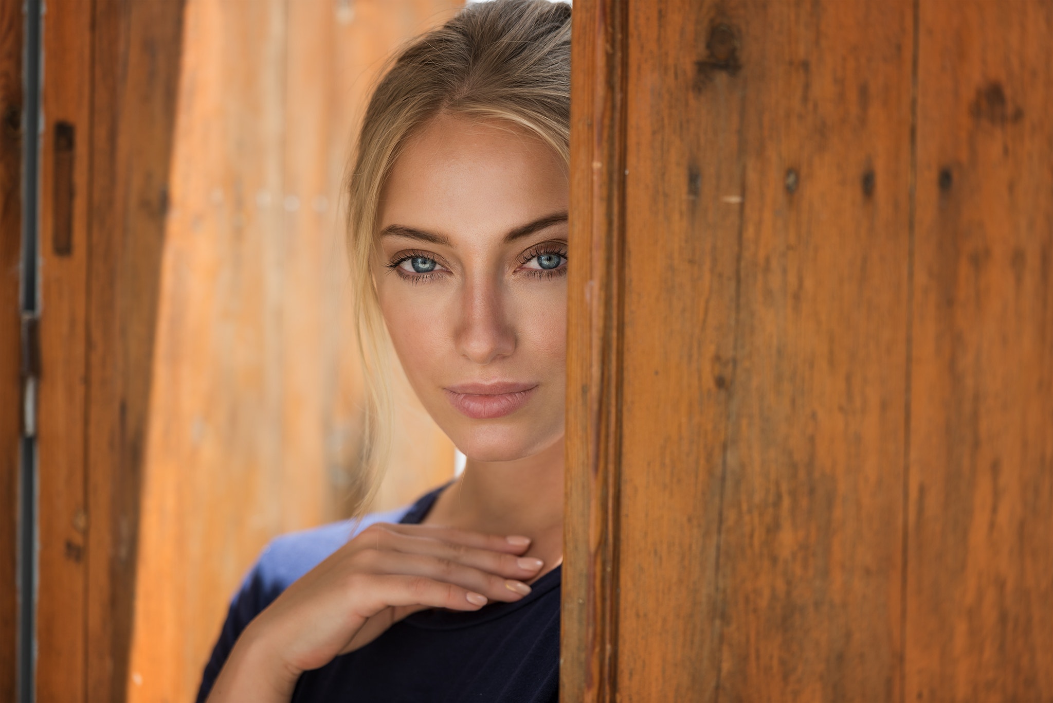 Portrait of a blonde woman with blue eyes HD Wallpaper