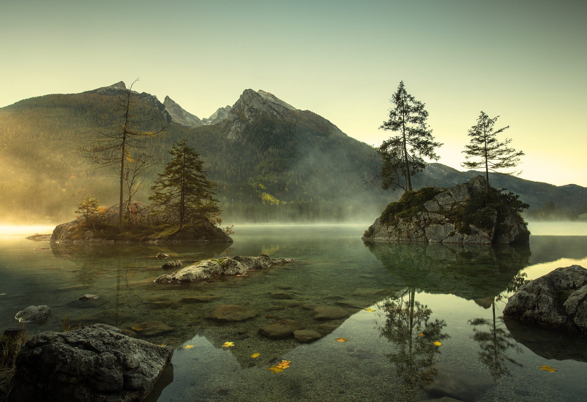 Misty lake with islands and mountains in Germany HD Wallpaper