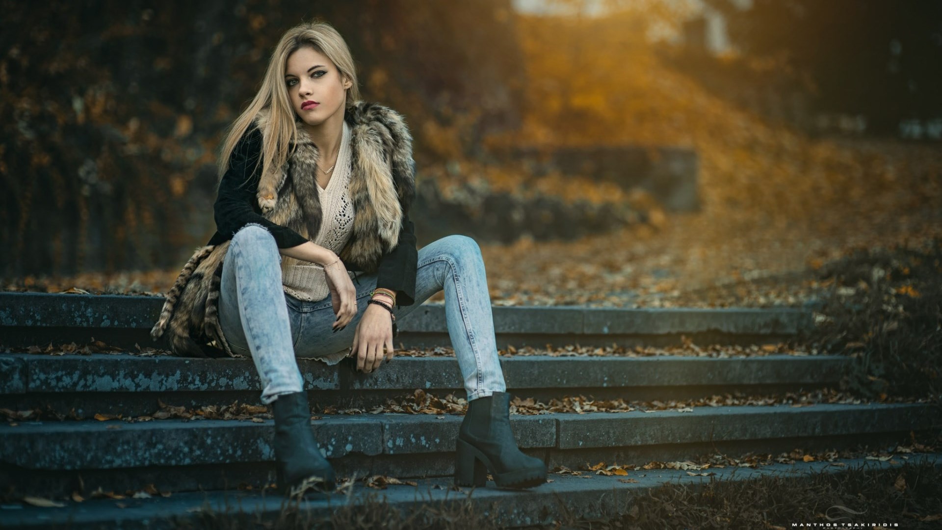 Woman sitting on stairs in fall HD Wallpaper