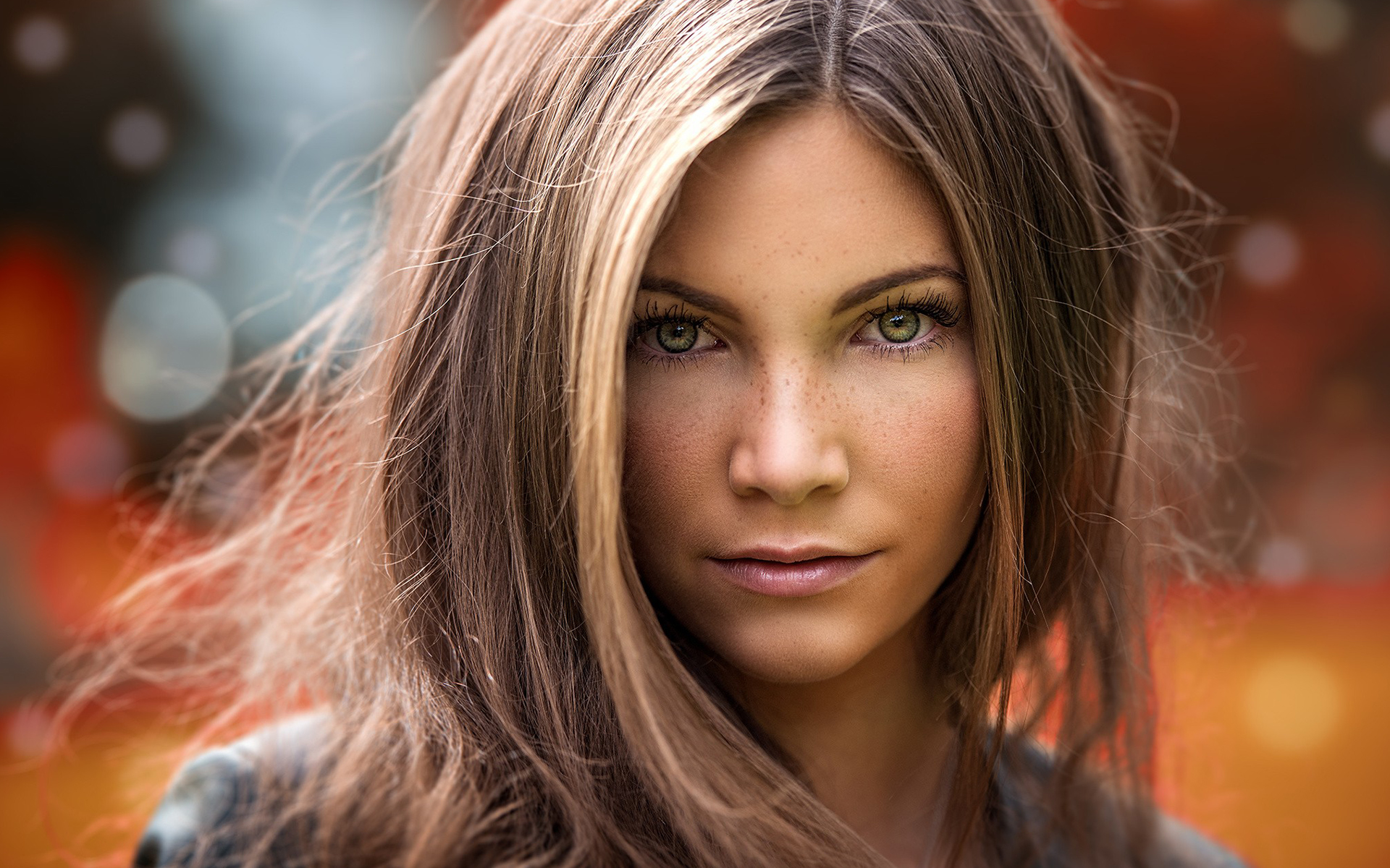 Close-up portrait of a young woman with freckles HD Wallpaper
