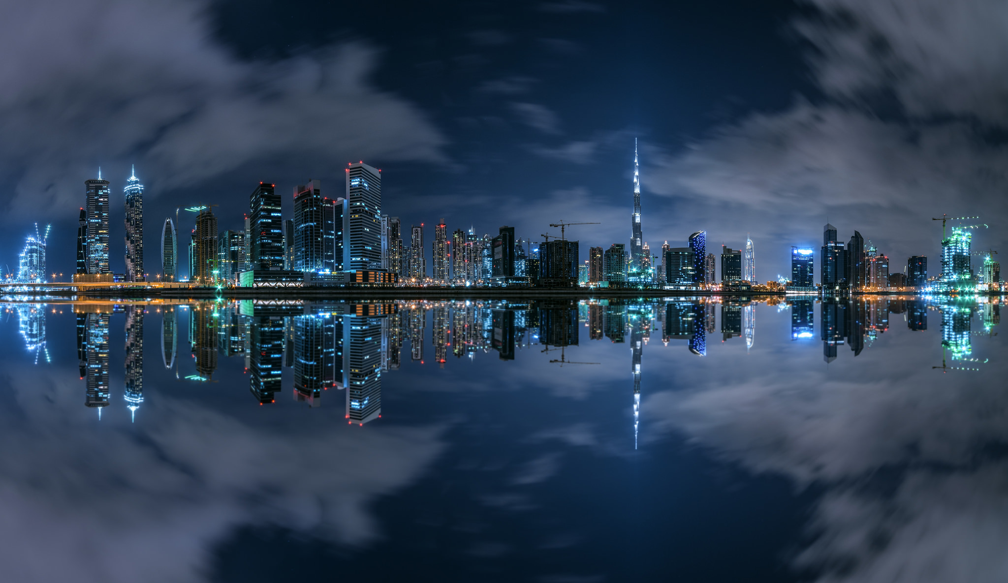 Dubai cityscape with reflections at night HD Wallpaper