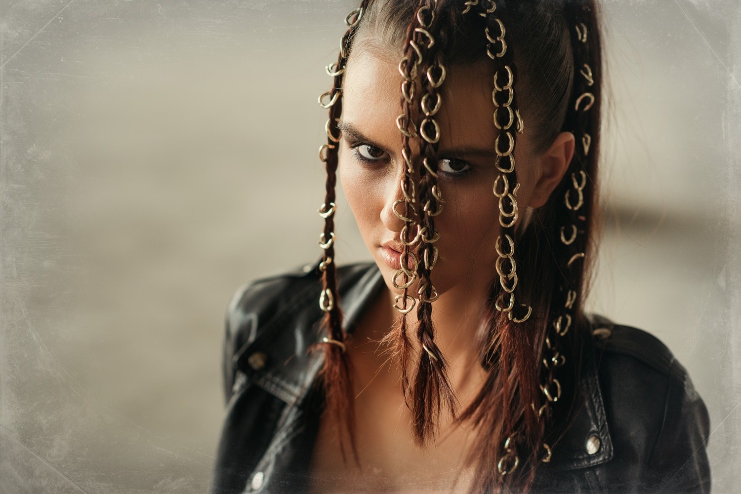 Woman with braided hair and metal rings HD Wallpaper