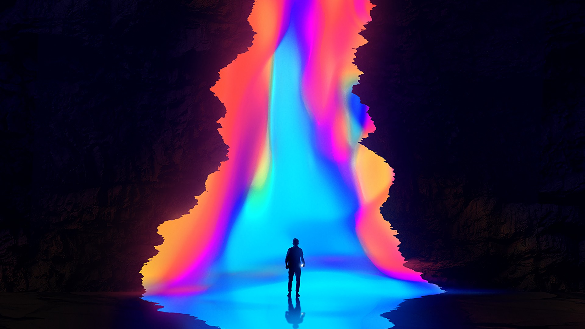 Man standing in a cave with a colorful light portal HD Wallpaper