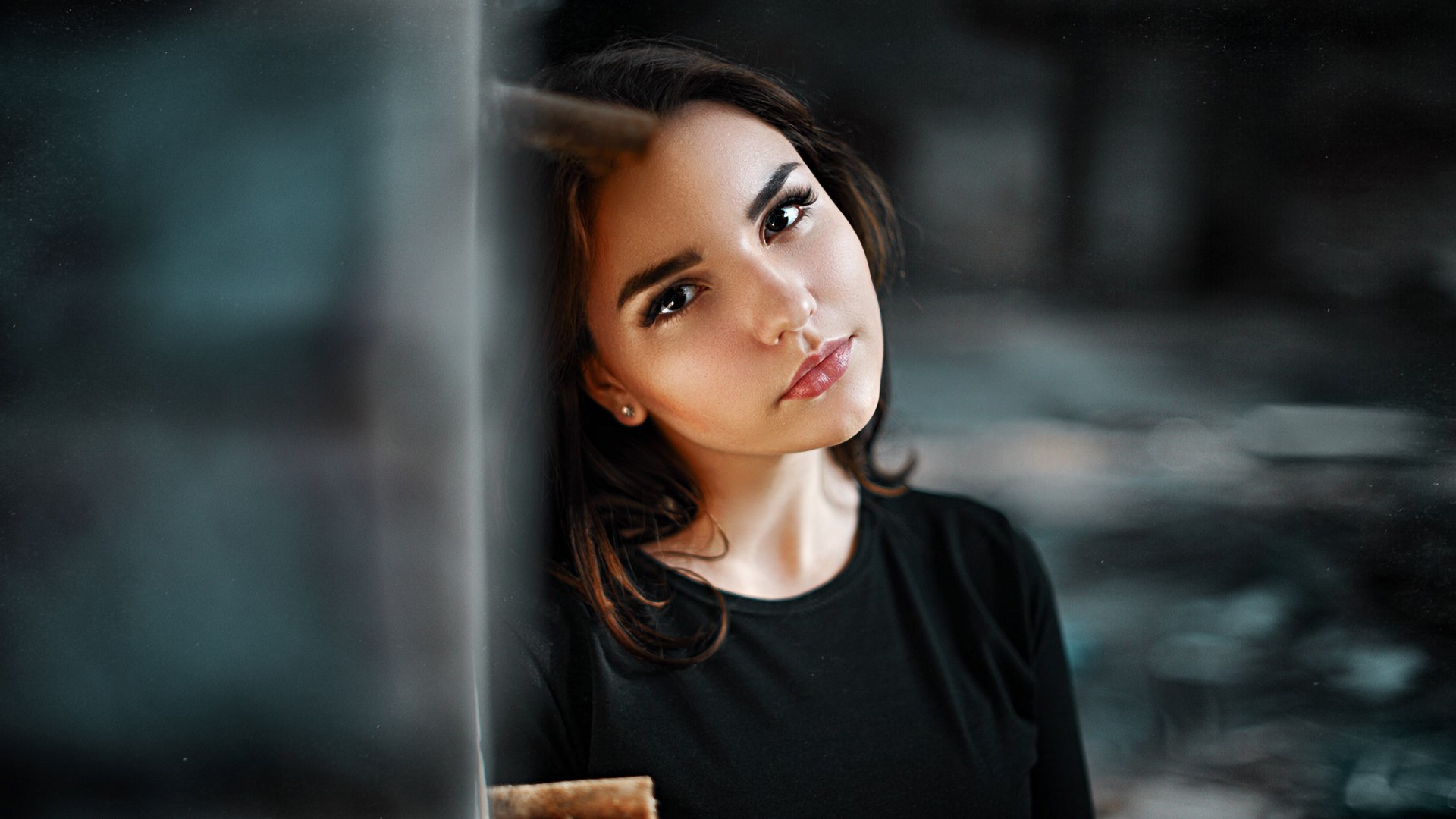Portrait of a young woman with dark hair HD Wallpaper