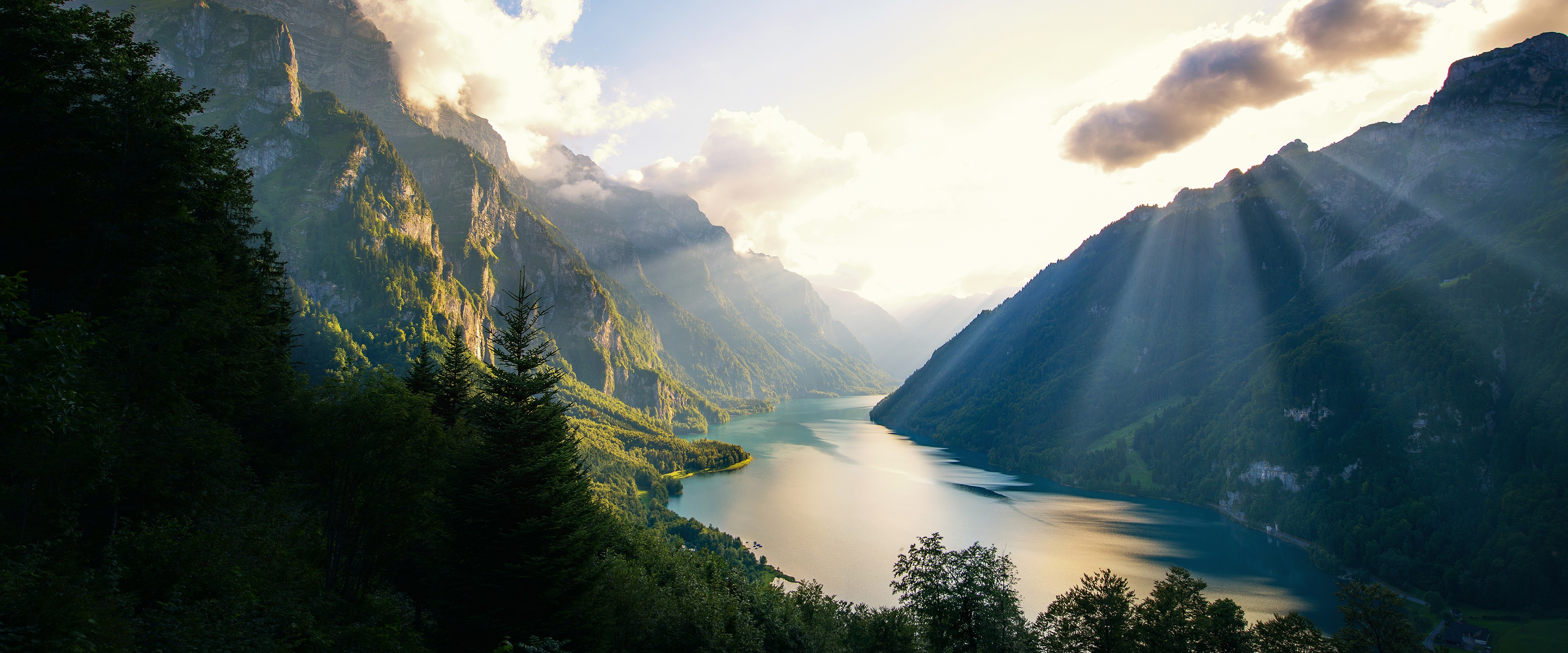 Sunbeams over a mountain lake landscape HD Wallpaper