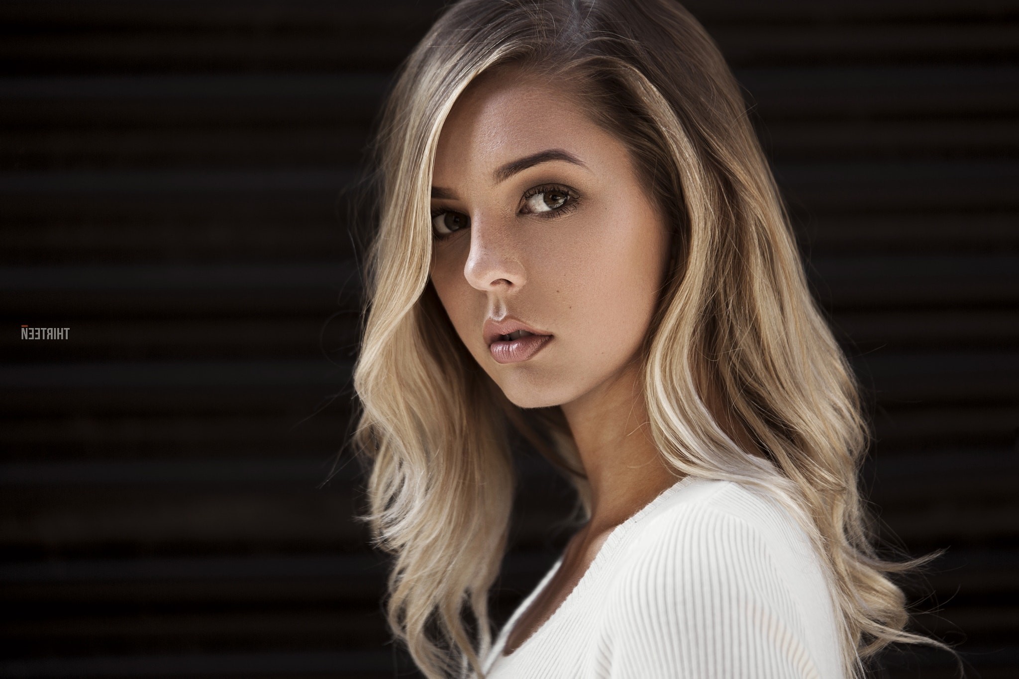 Woman with blonde hair in a white top HD Wallpaper