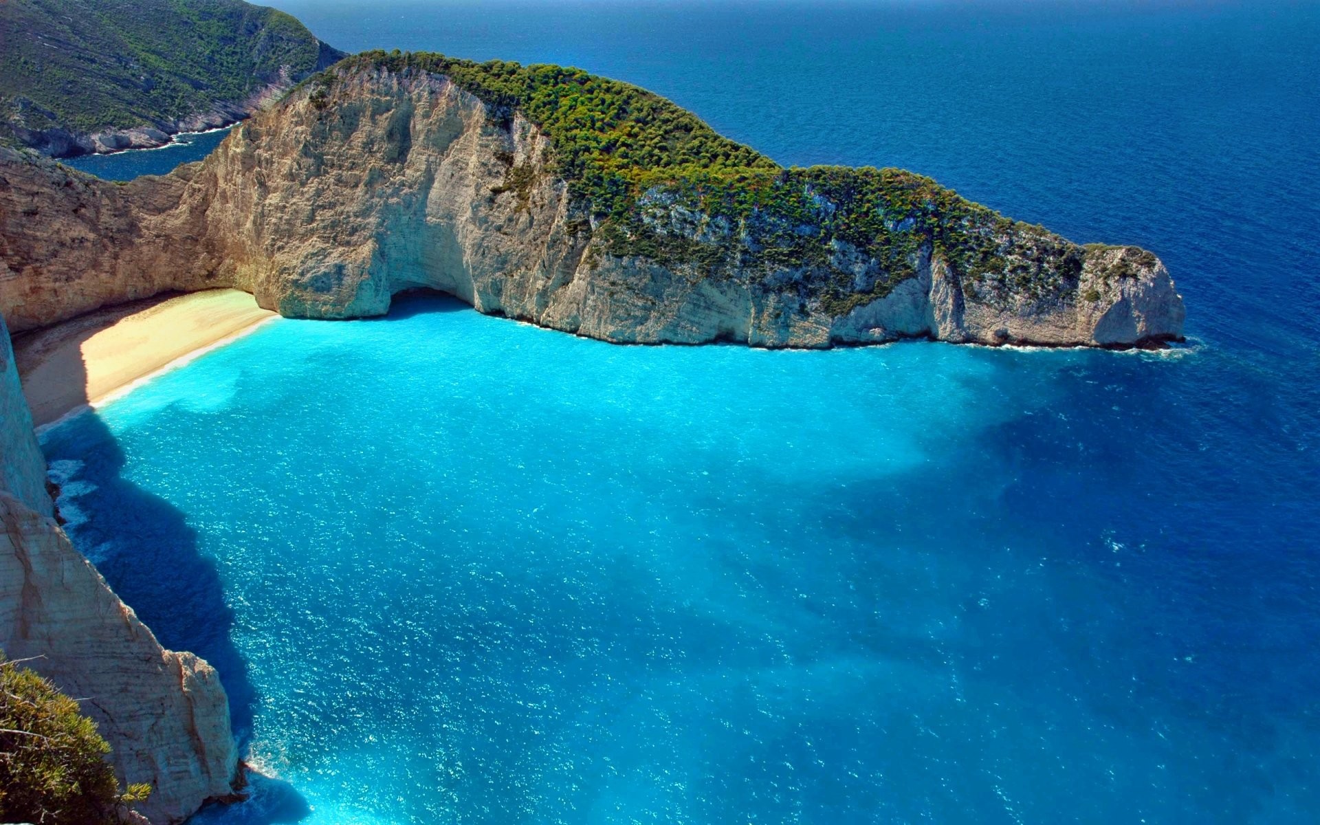 Navagio Beach, Zakynthos, Greece, with turquoise waters HD Wallpaper