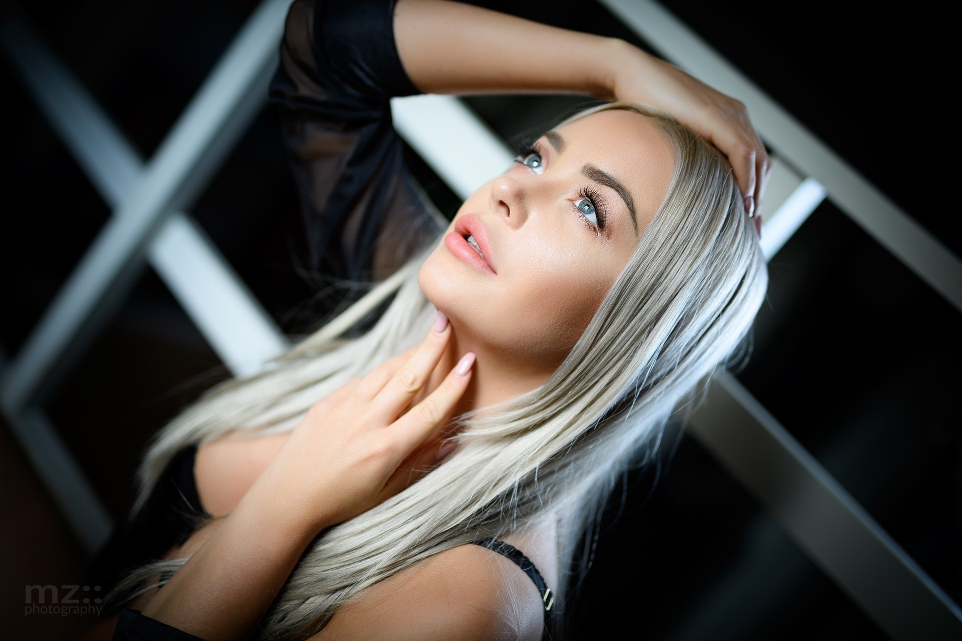 Woman with blonde hair touching her neck HD Wallpaper
