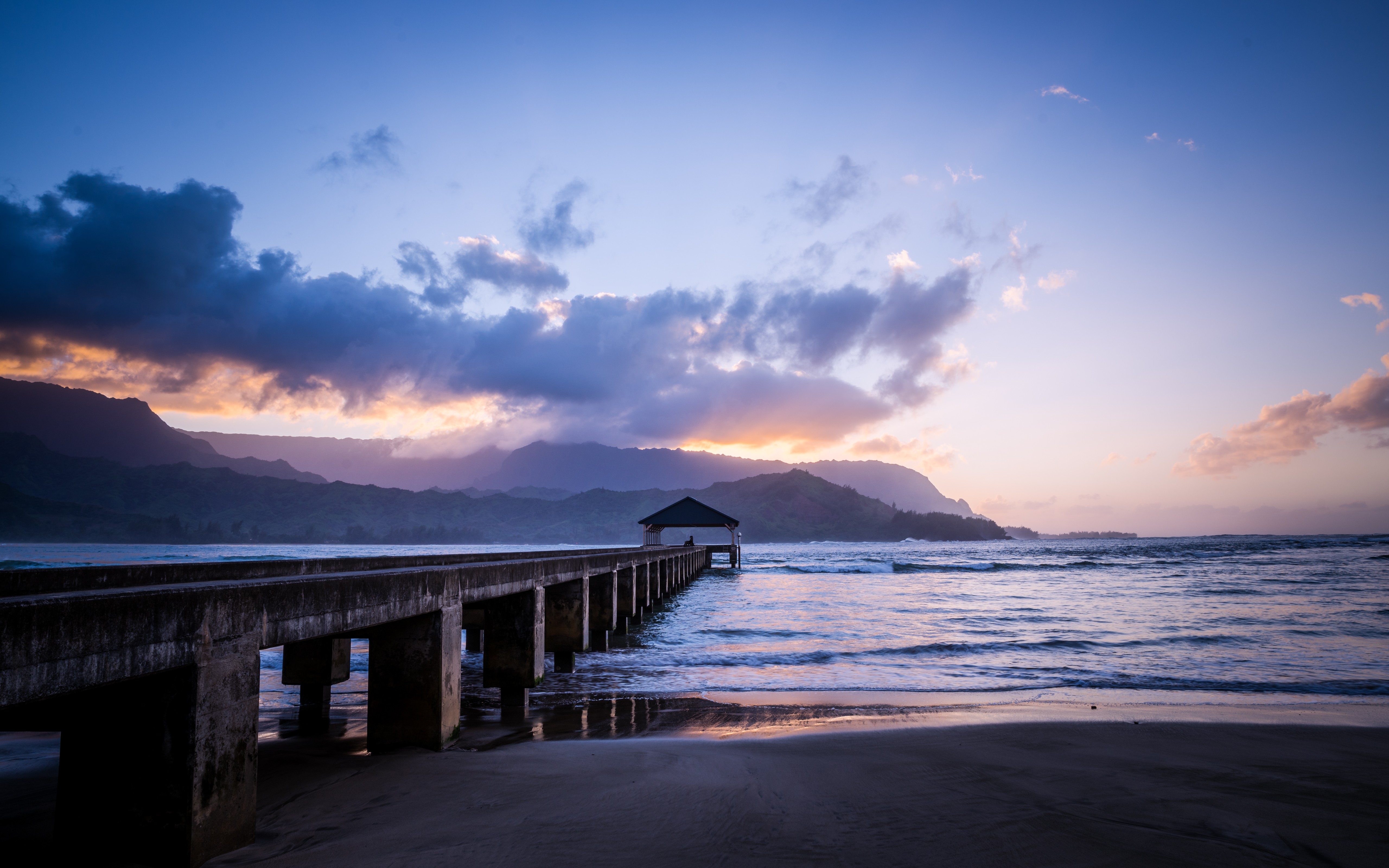 Pier and mountains at sunset HD Wallpaper