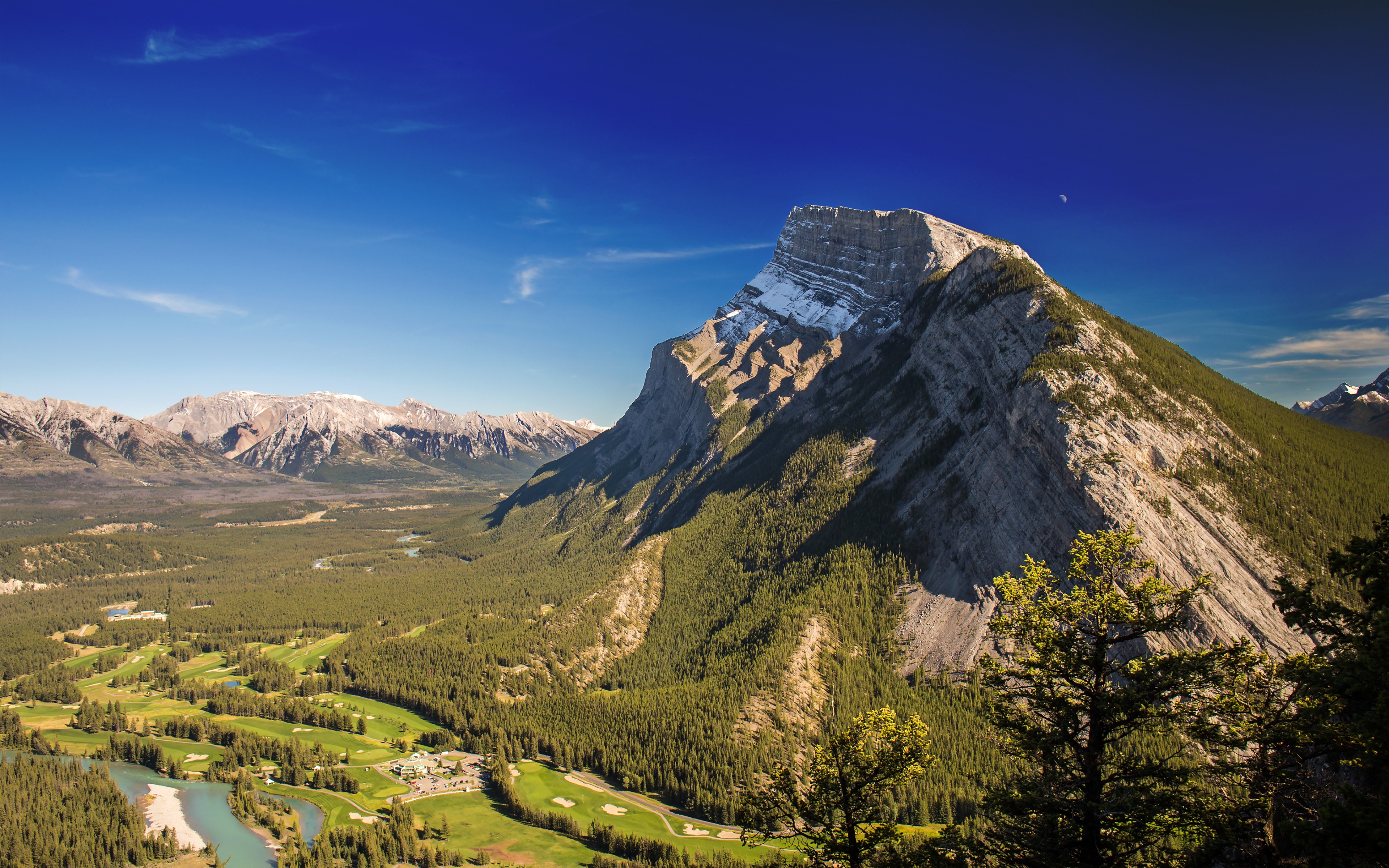 Mountain landscape with golf course and river HD Wallpaper