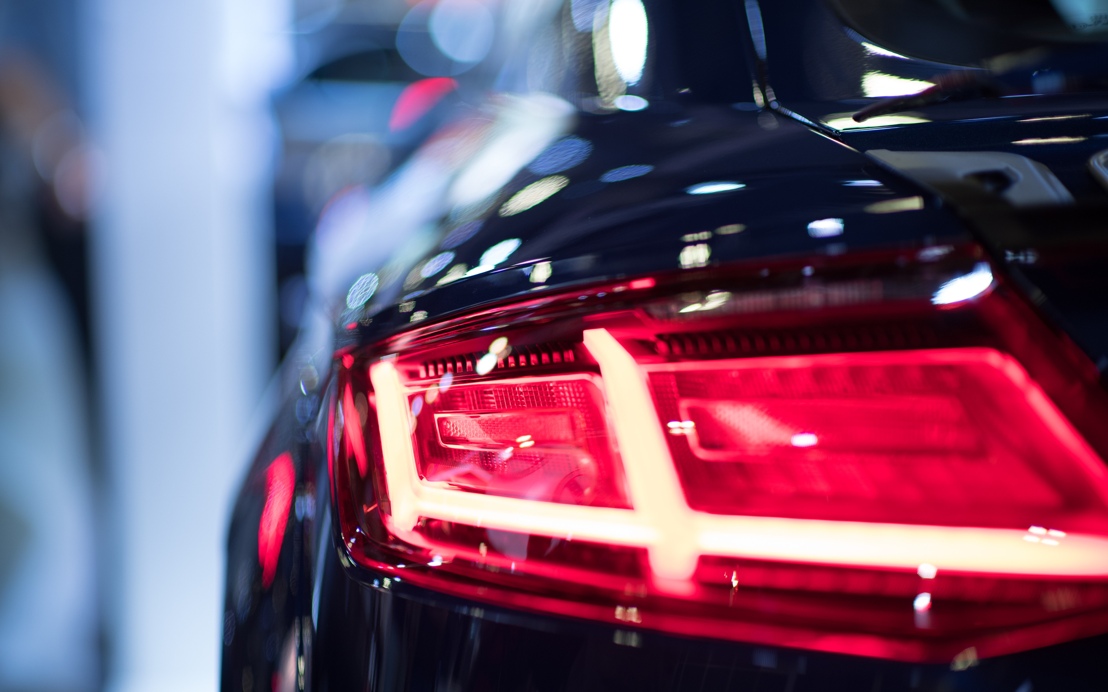 Close-up of Audi car tail lights HD Wallpaper