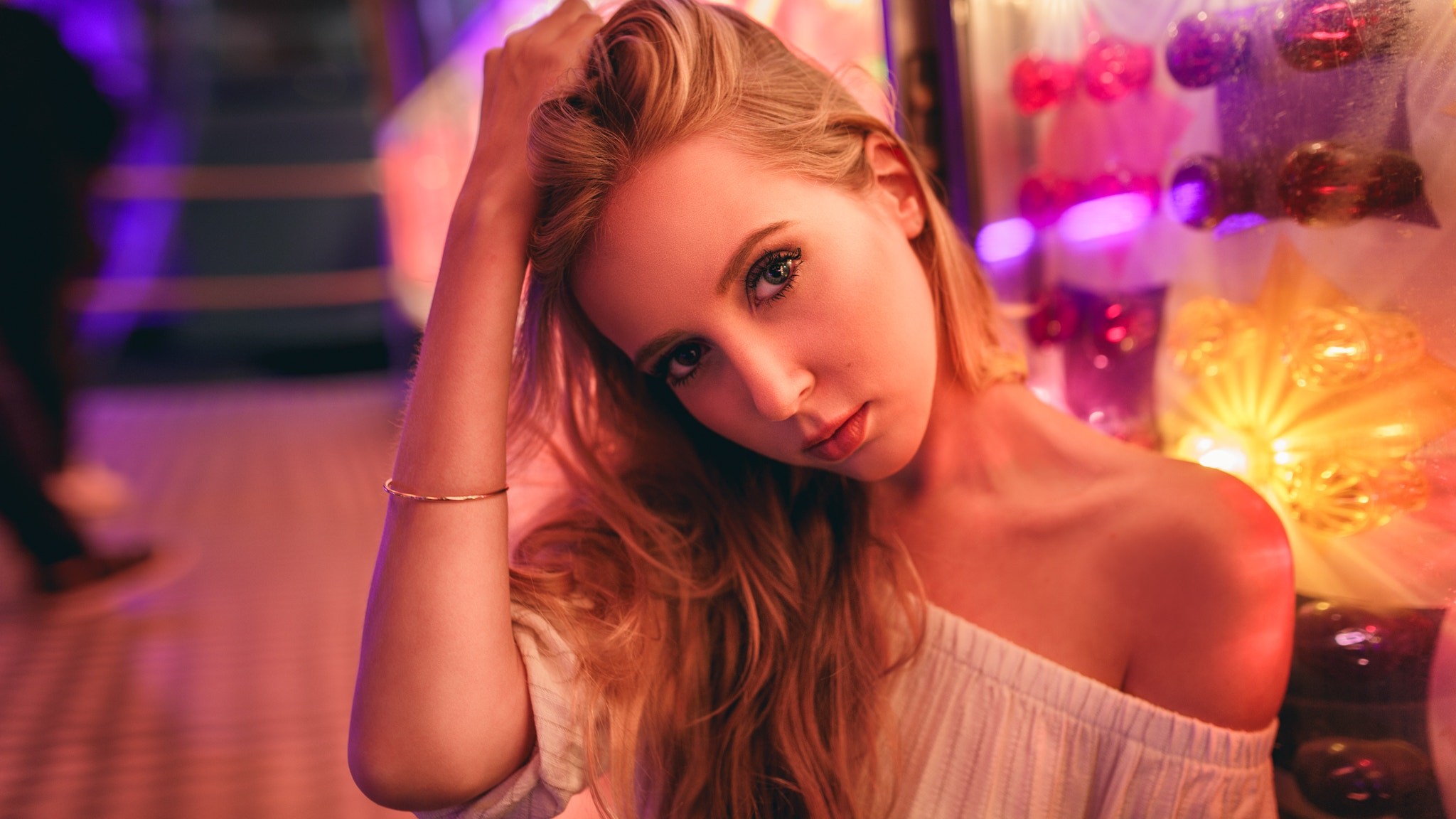 Woman with hand in hair, bokeh lights HD Wallpaper