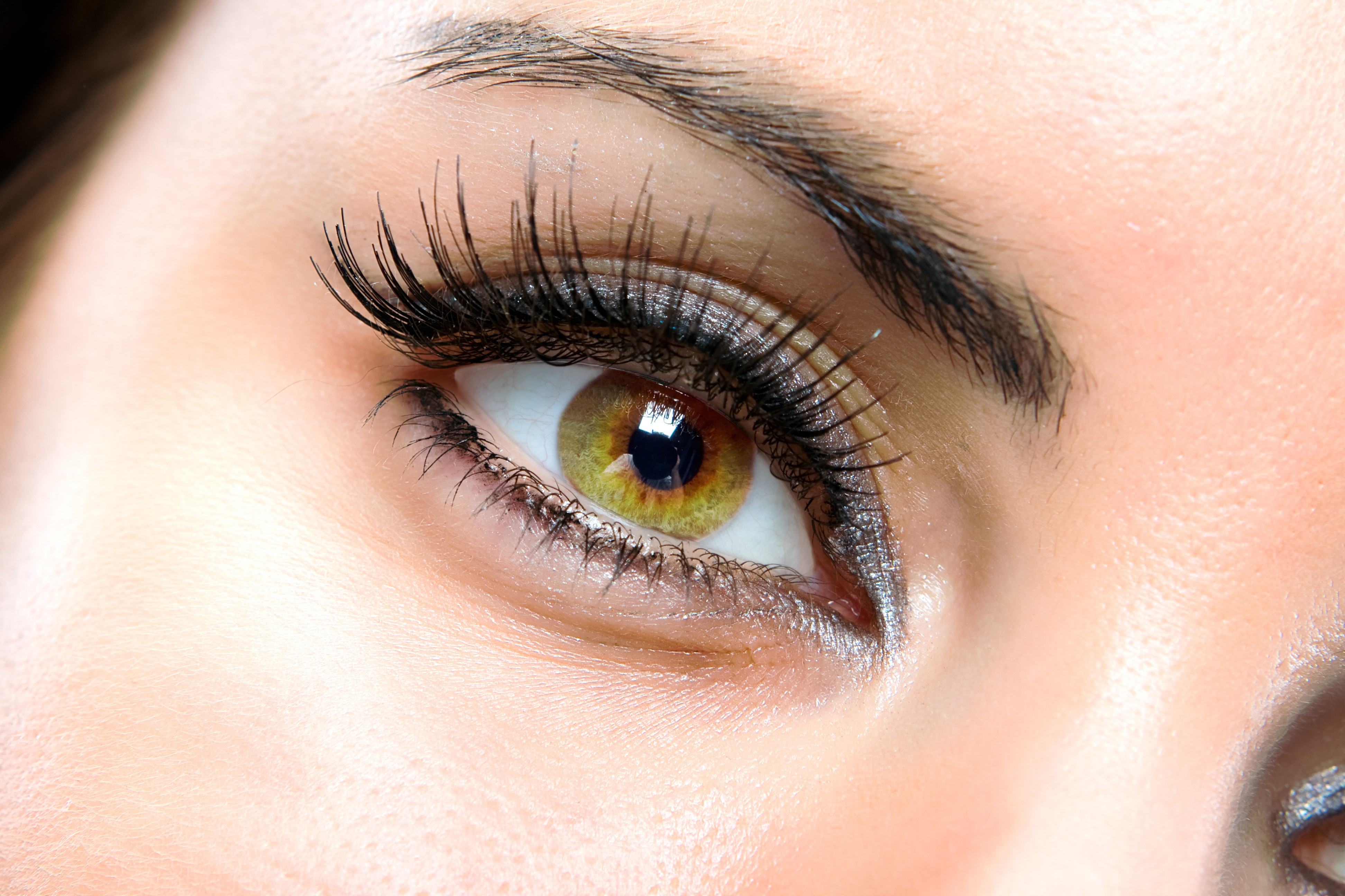 Close-up of a woman's eye with makeup HD Wallpaper