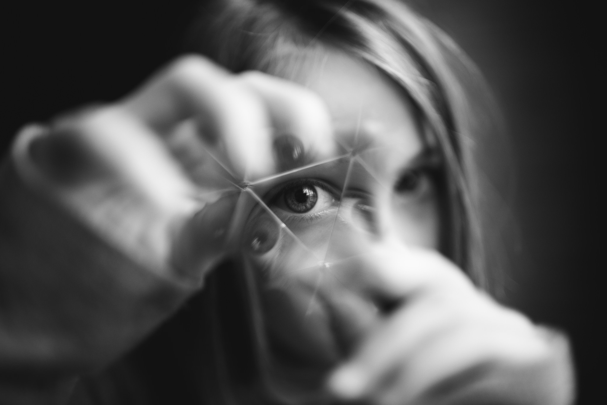 Close-up of a young girl's eye through a prism HD Wallpaper