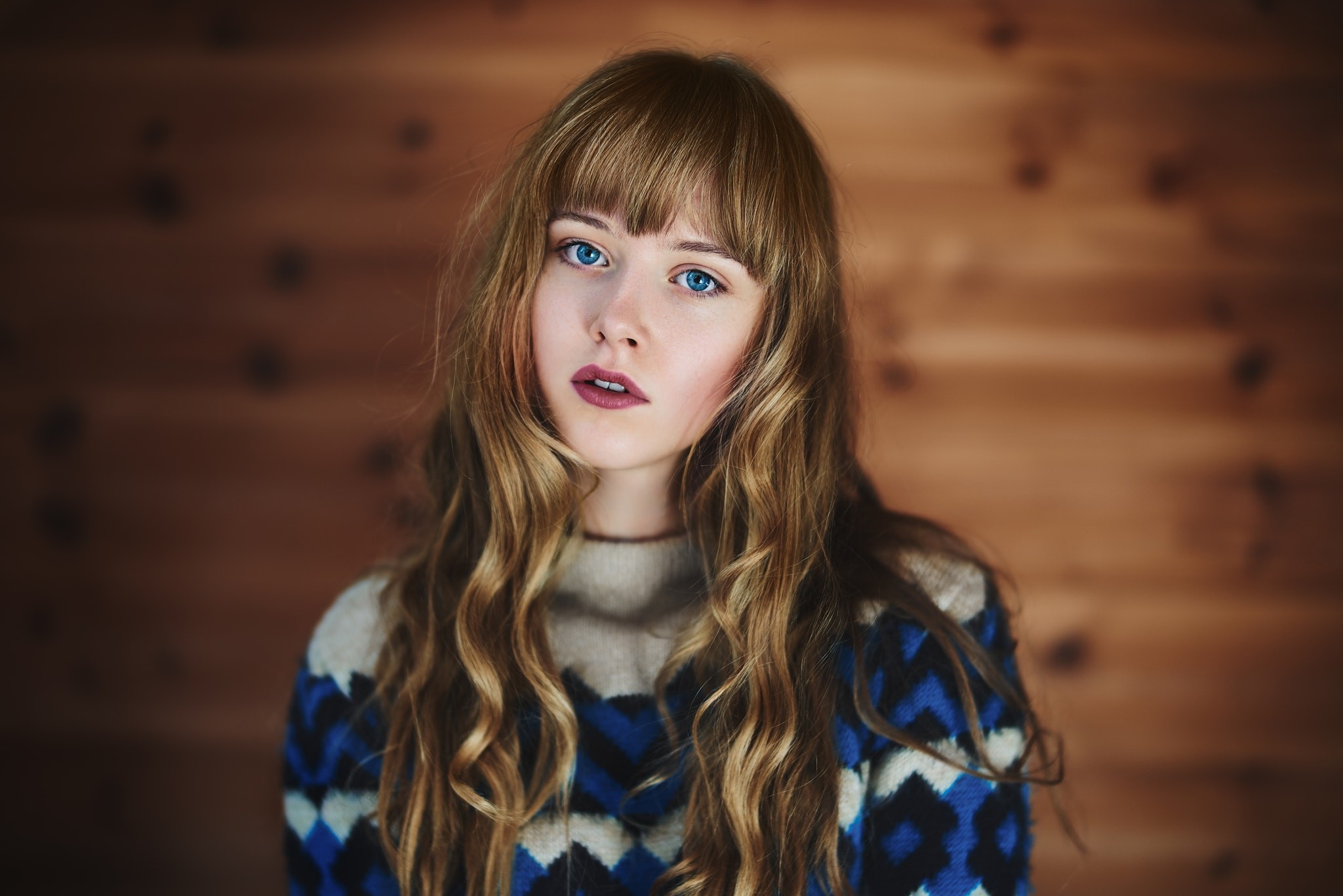 Portrait of a young woman with blue eyes and blonde hair HD Wallpaper