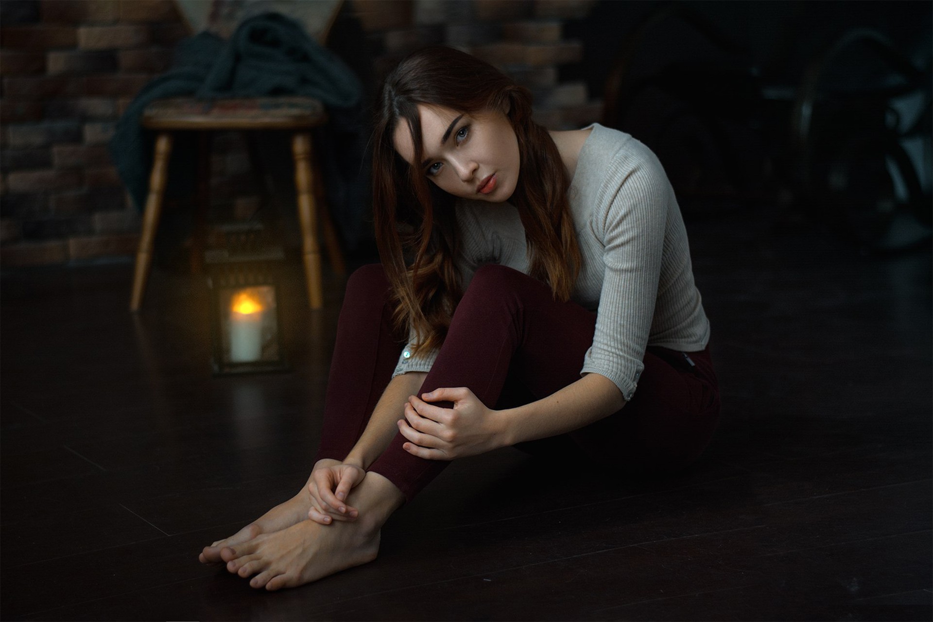 Woman sitting on the floor indoors HD Wallpaper