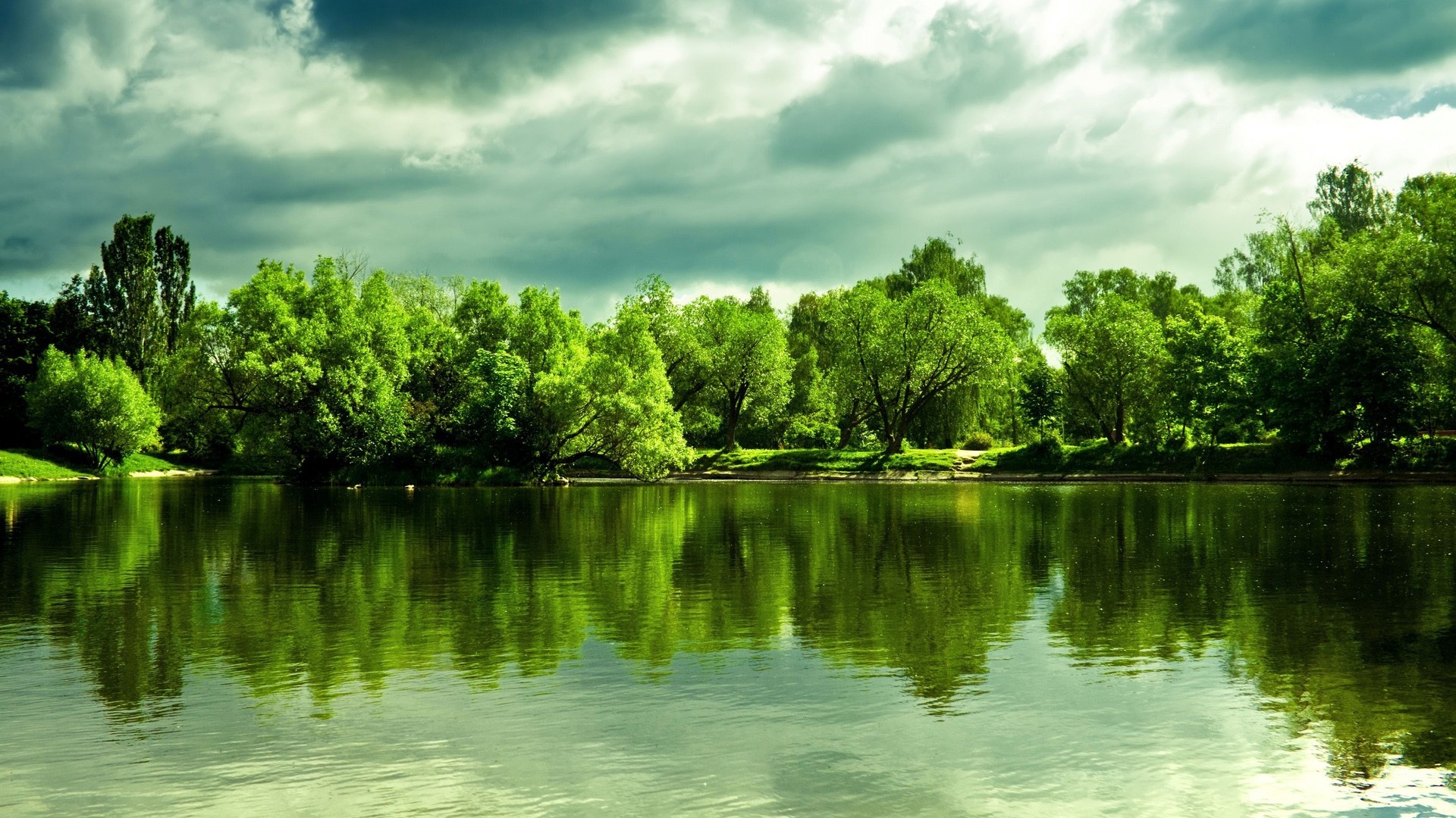 Lake with trees and cloudy sky HD Wallpaper