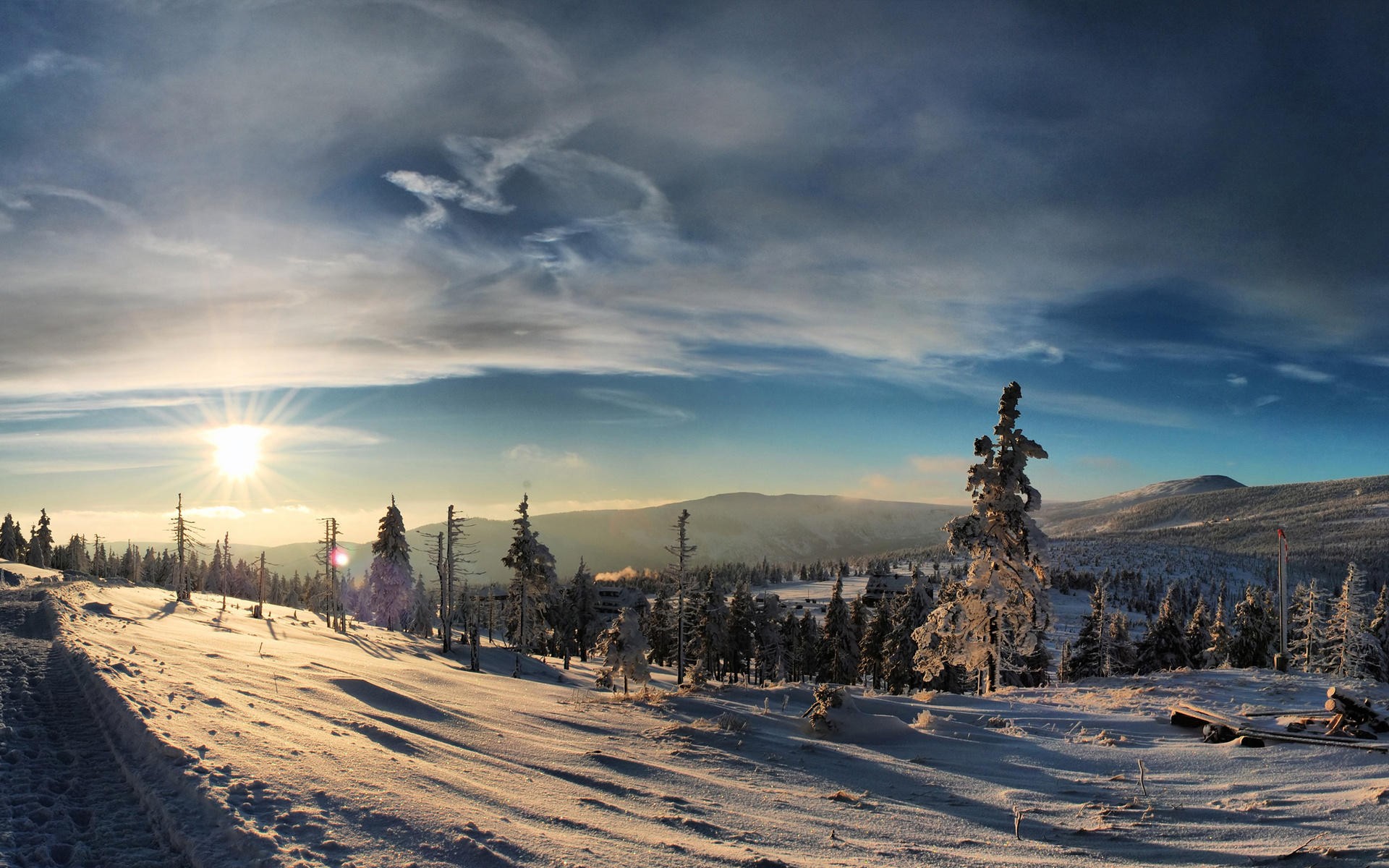 Snowy mountain landscape with trees and sun HD Wallpaper