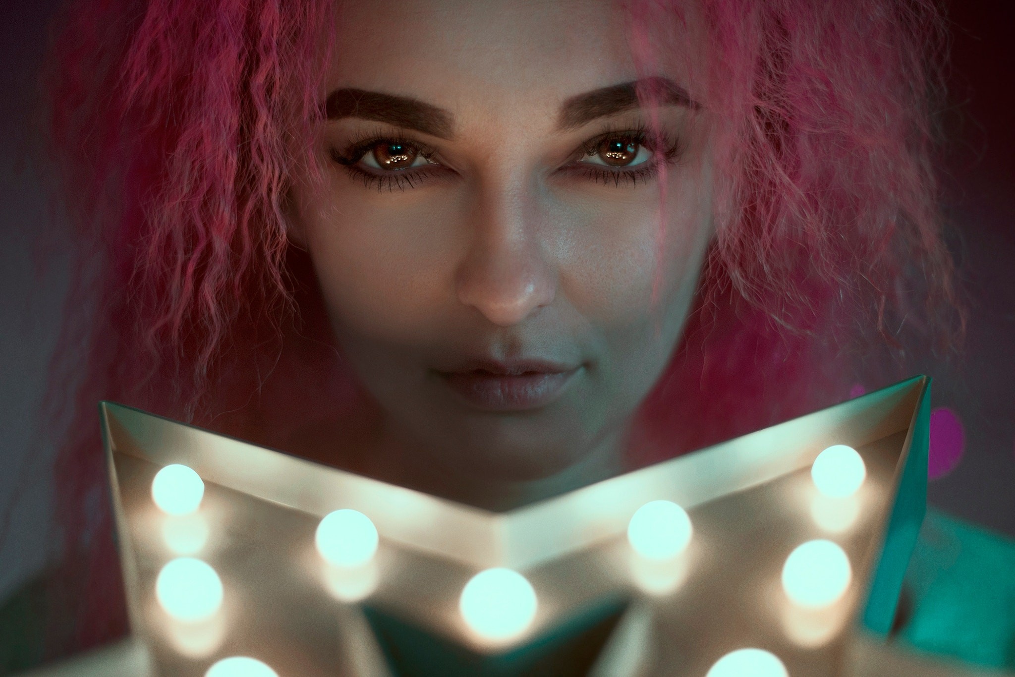 Woman with pink hair holding a star light HD Wallpaper