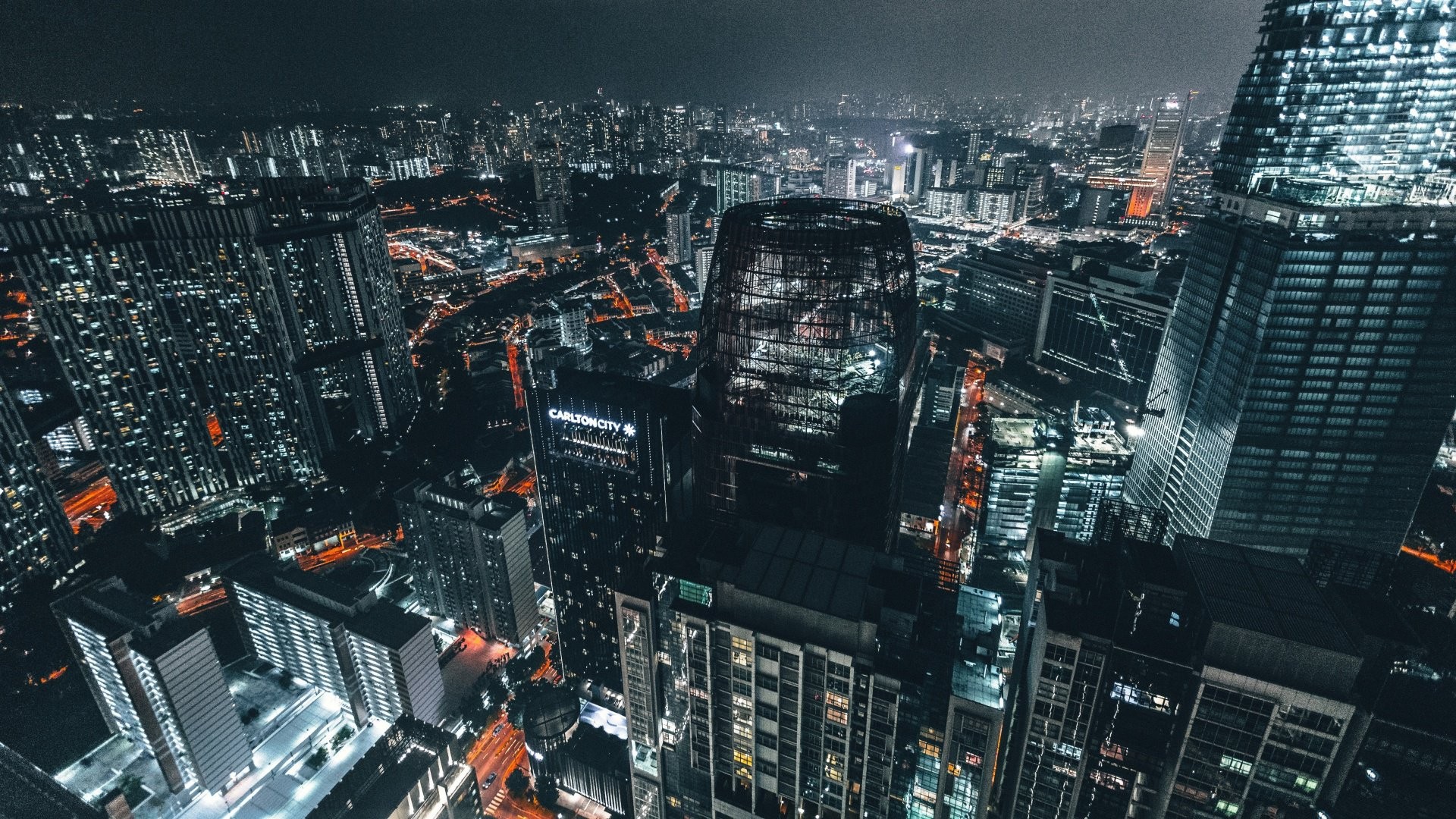 Night cityscape with illuminated skyscrapers HD Wallpaper