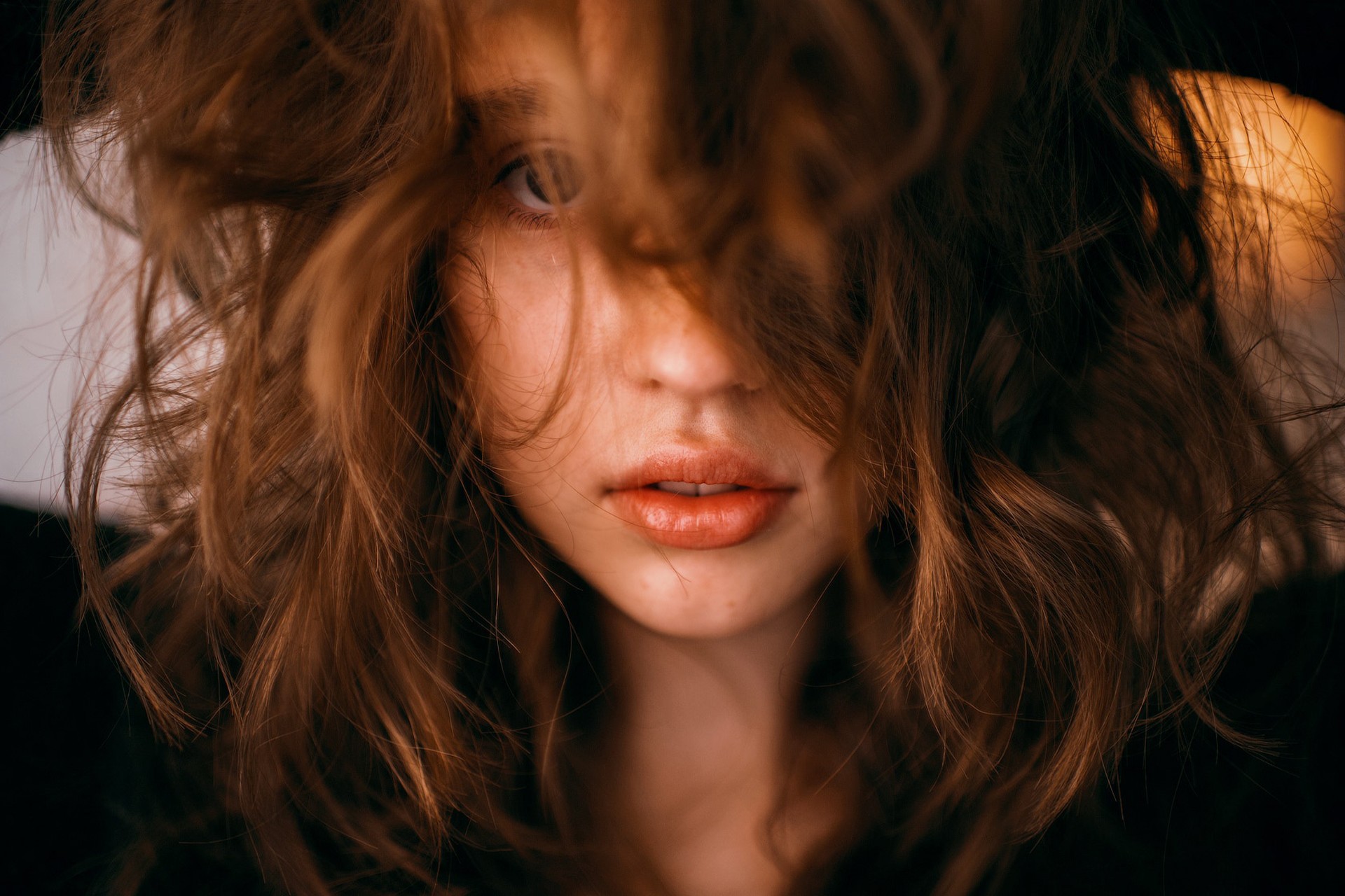 Portrait of a woman with hair covering her face HD Wallpaper