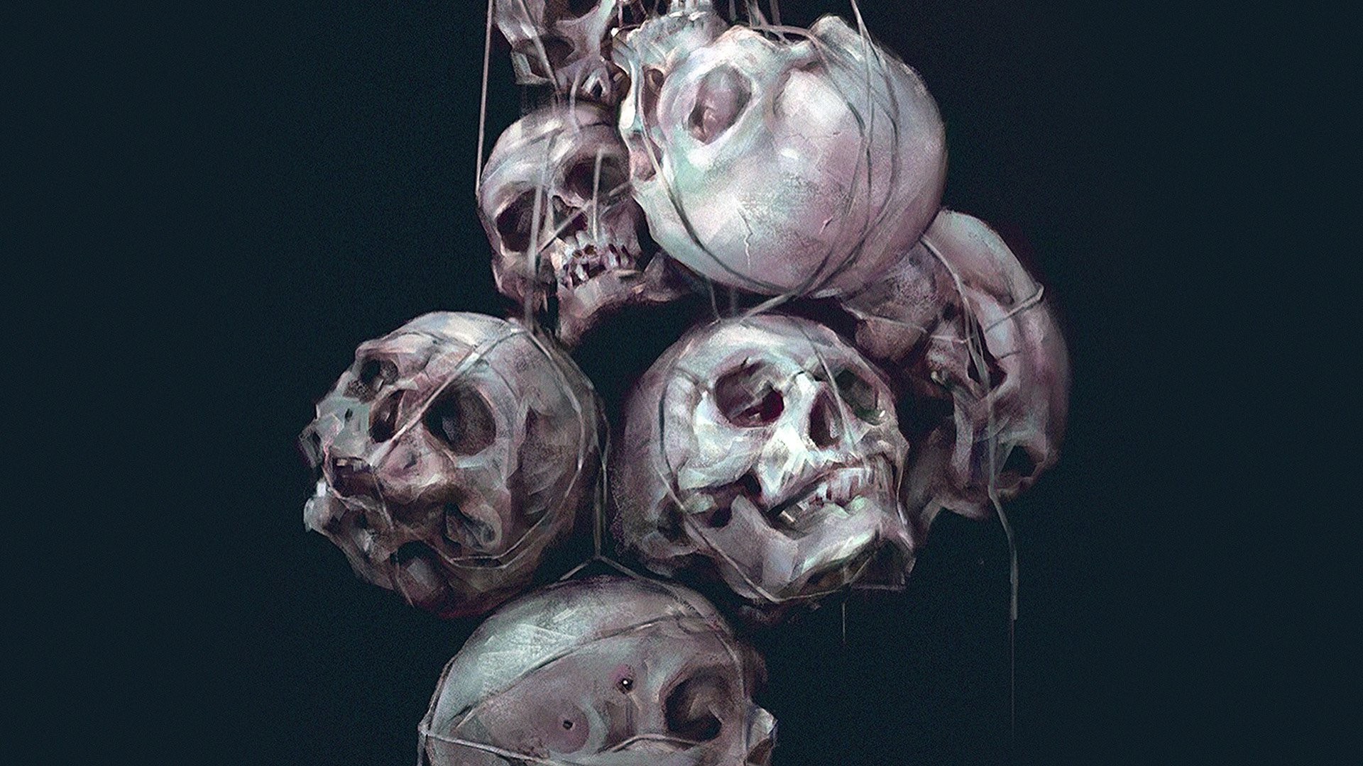 A macabre display of skulls tied together HD Wallpaper