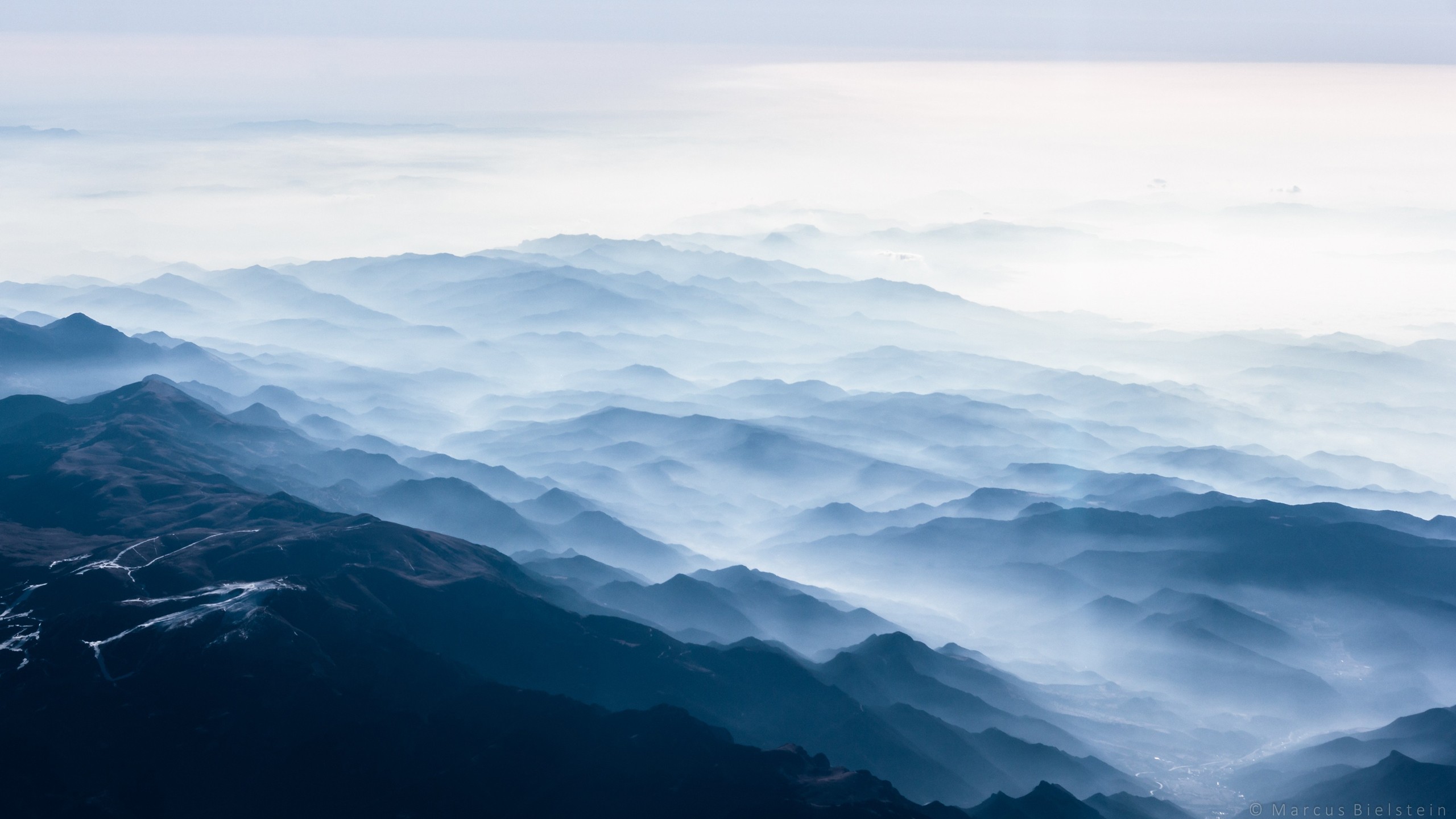 Misty mountain range landscape HD Wallpaper
