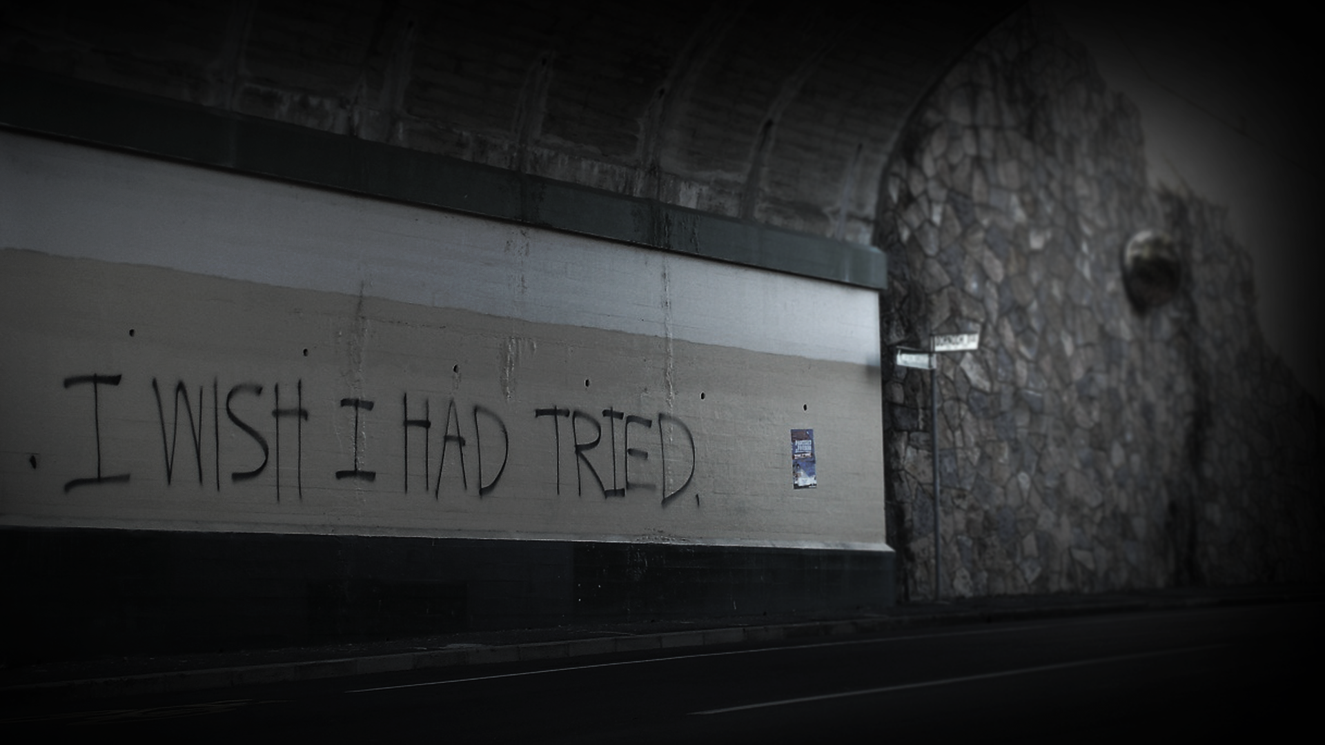 Graffiti quote "I wish I had tried" on a wall HD Wallpaper