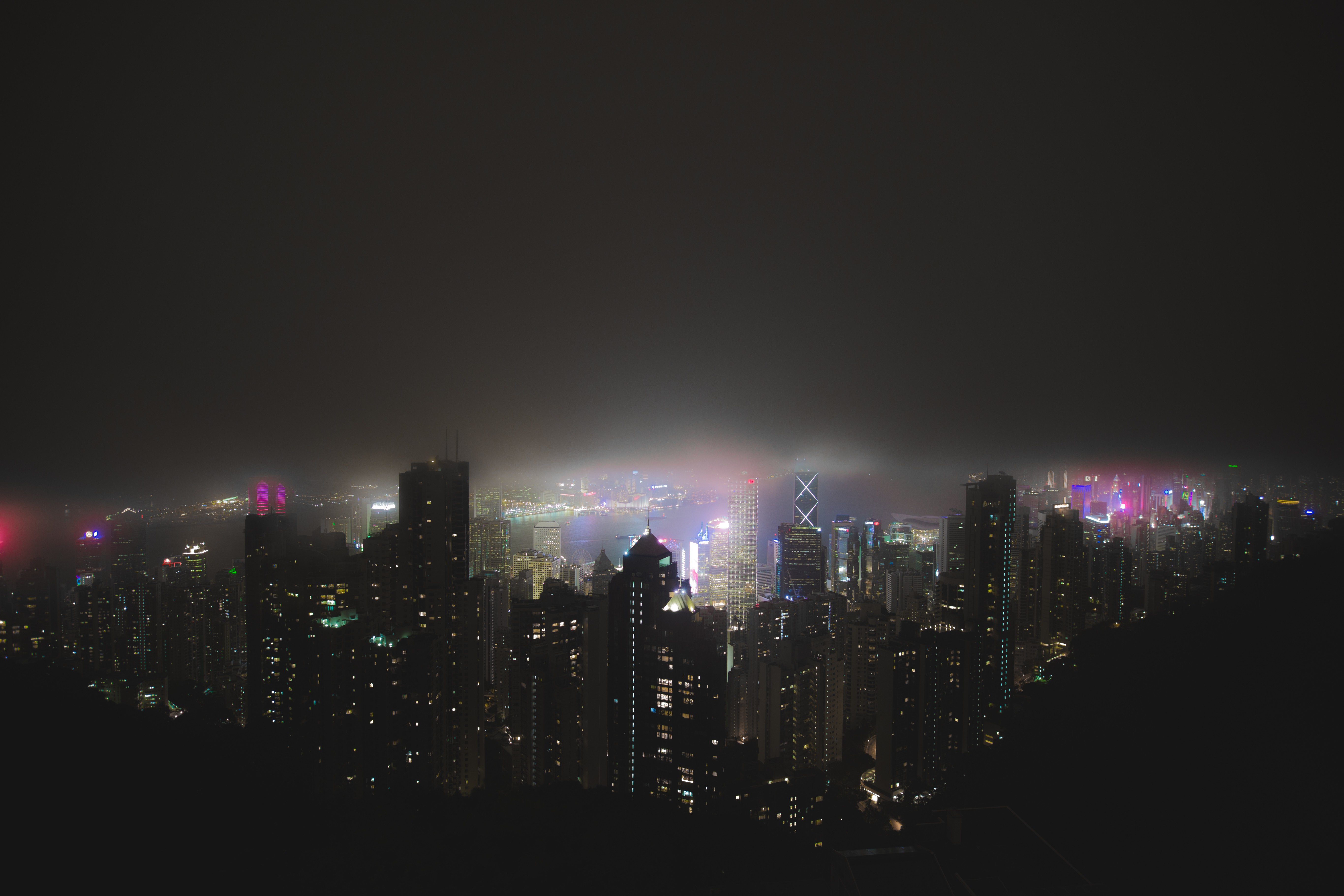 Hong Kong skyline at night with mist HD Wallpaper