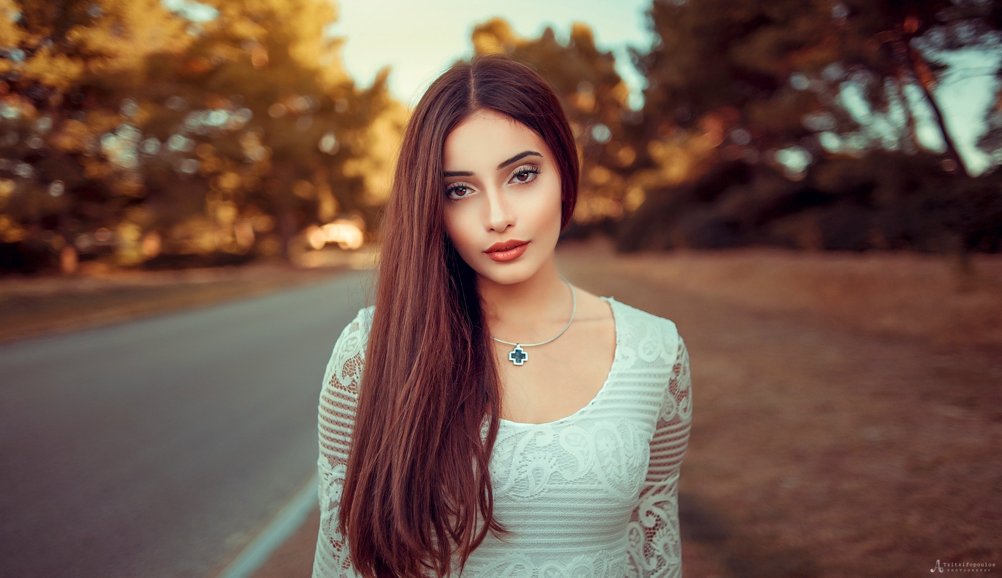 Woman with long brown hair wearing a white dress and necklace HD Wallpaper
