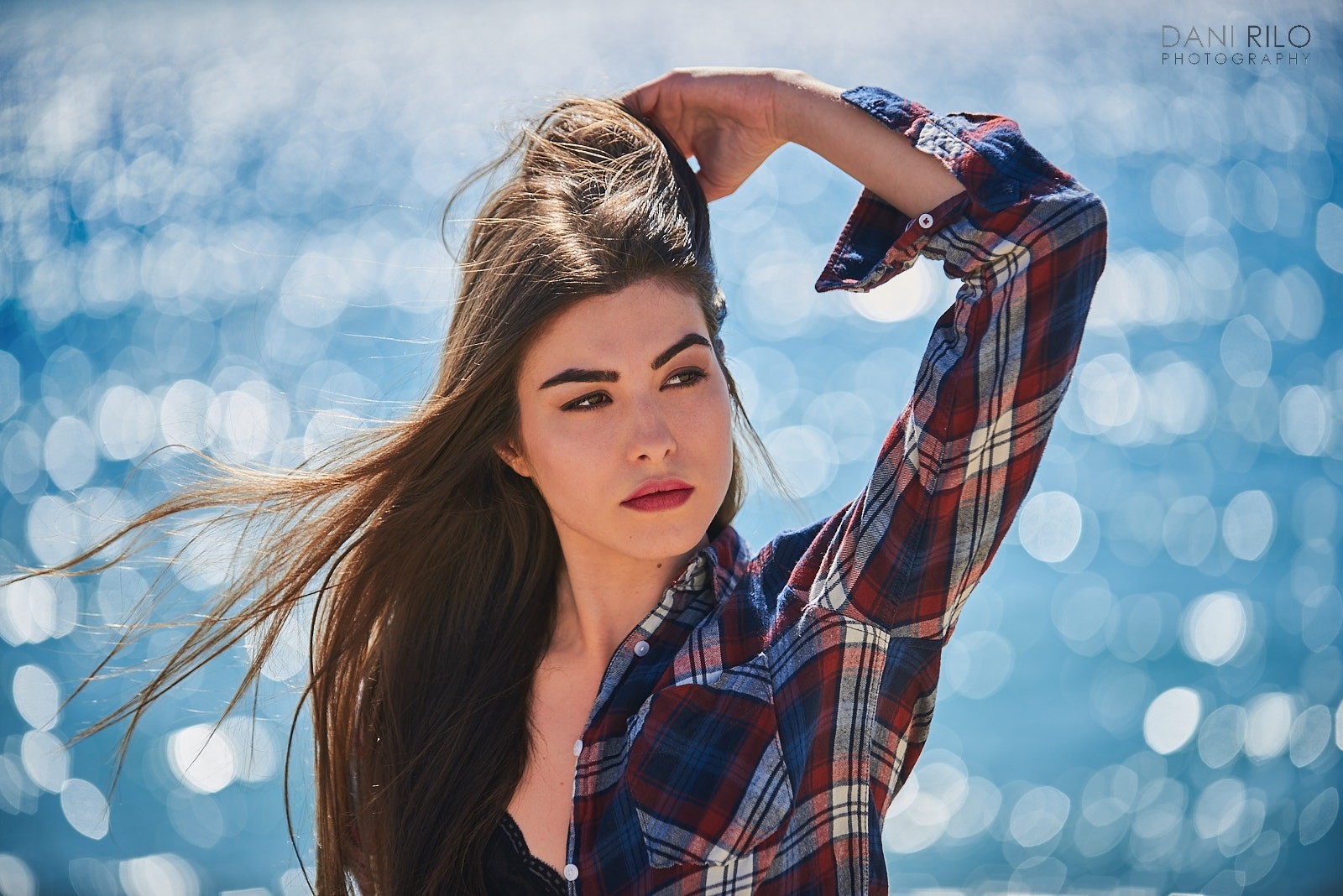Woman with long brown hair in a plaid shirt HD Wallpaper