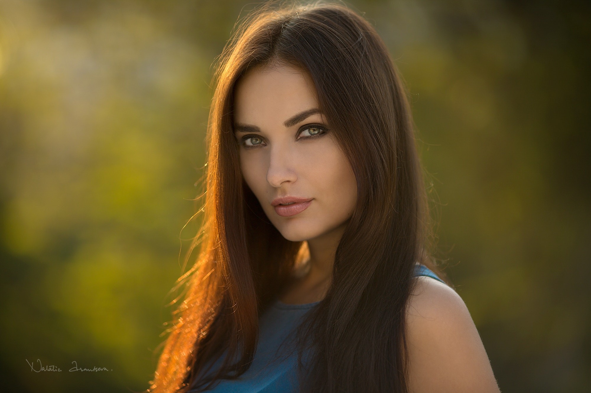 Woman with long brown hair in a blue top HD Wallpaper