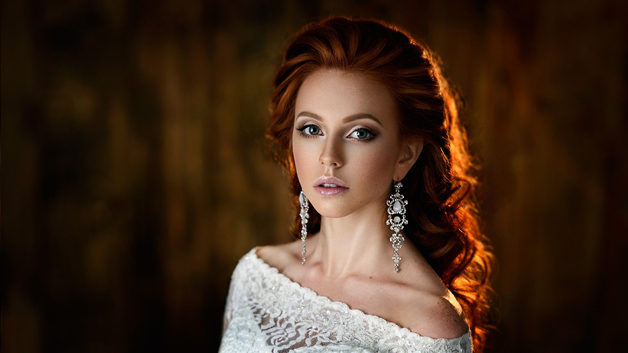 Redhead woman with elaborate earrings and white dress HD Wallpaper