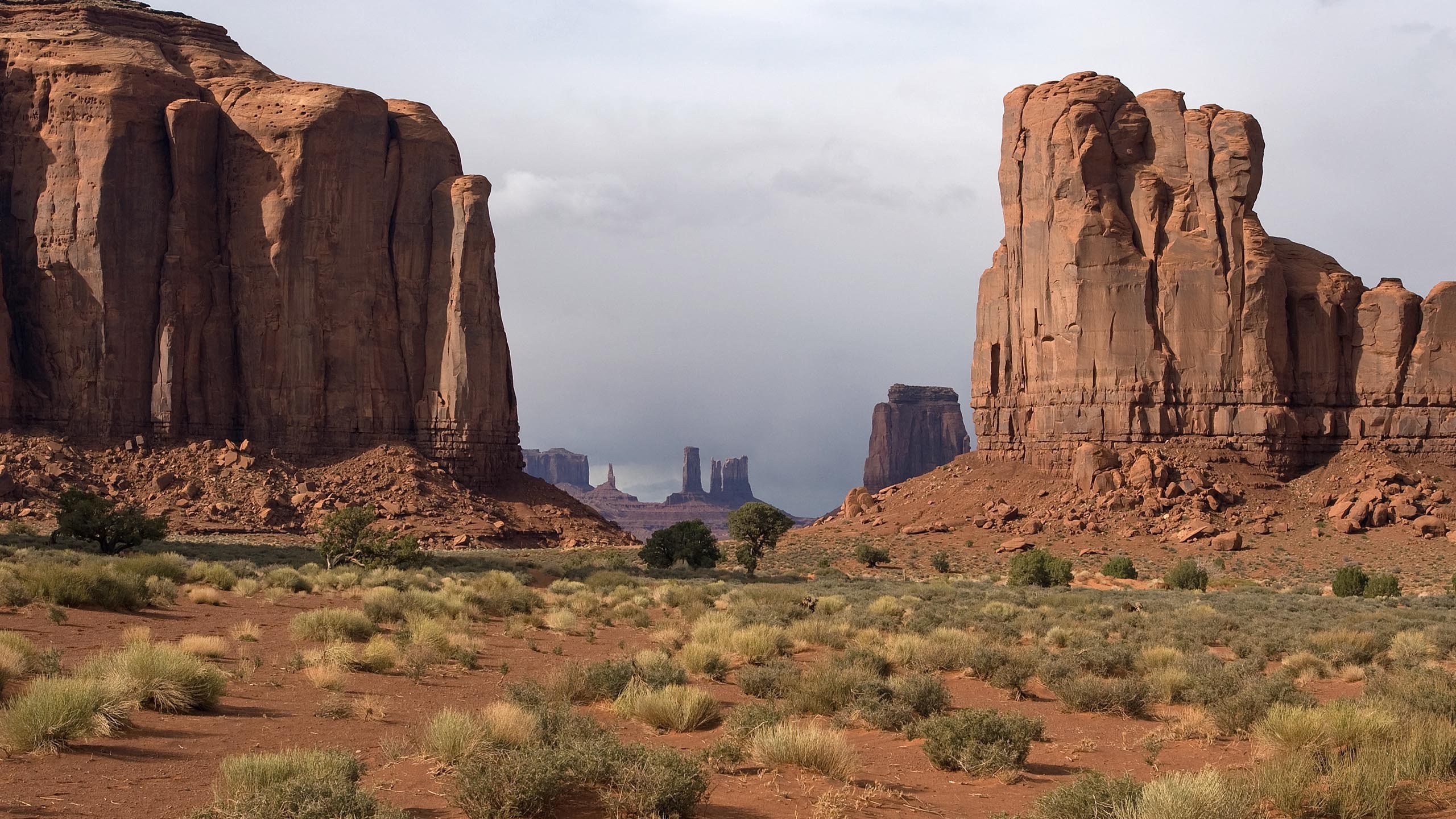 Monument Valley landscape with sandstone formations HD Wallpaper