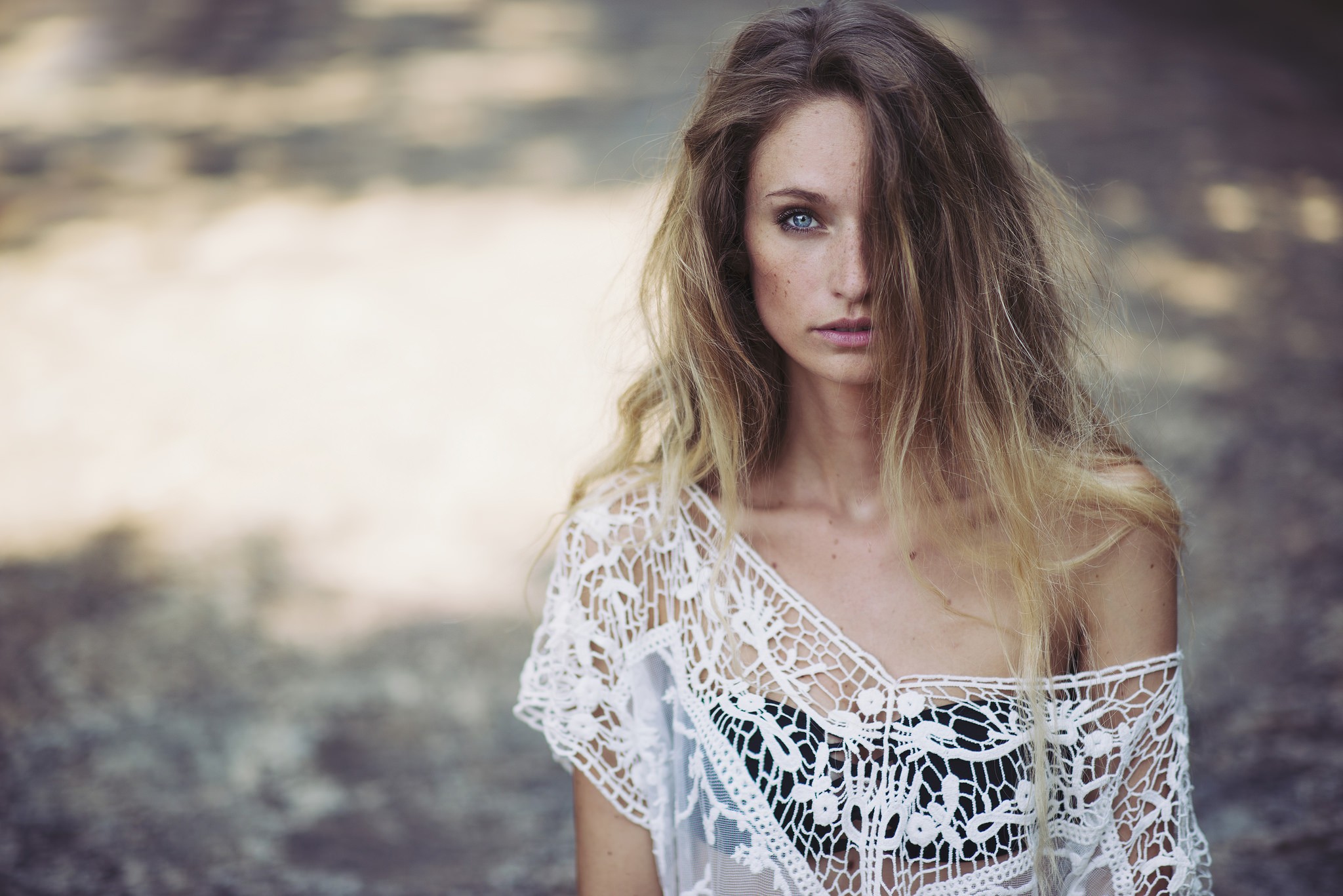 Woman with long hair and blue eyes outdoors HD Wallpaper
