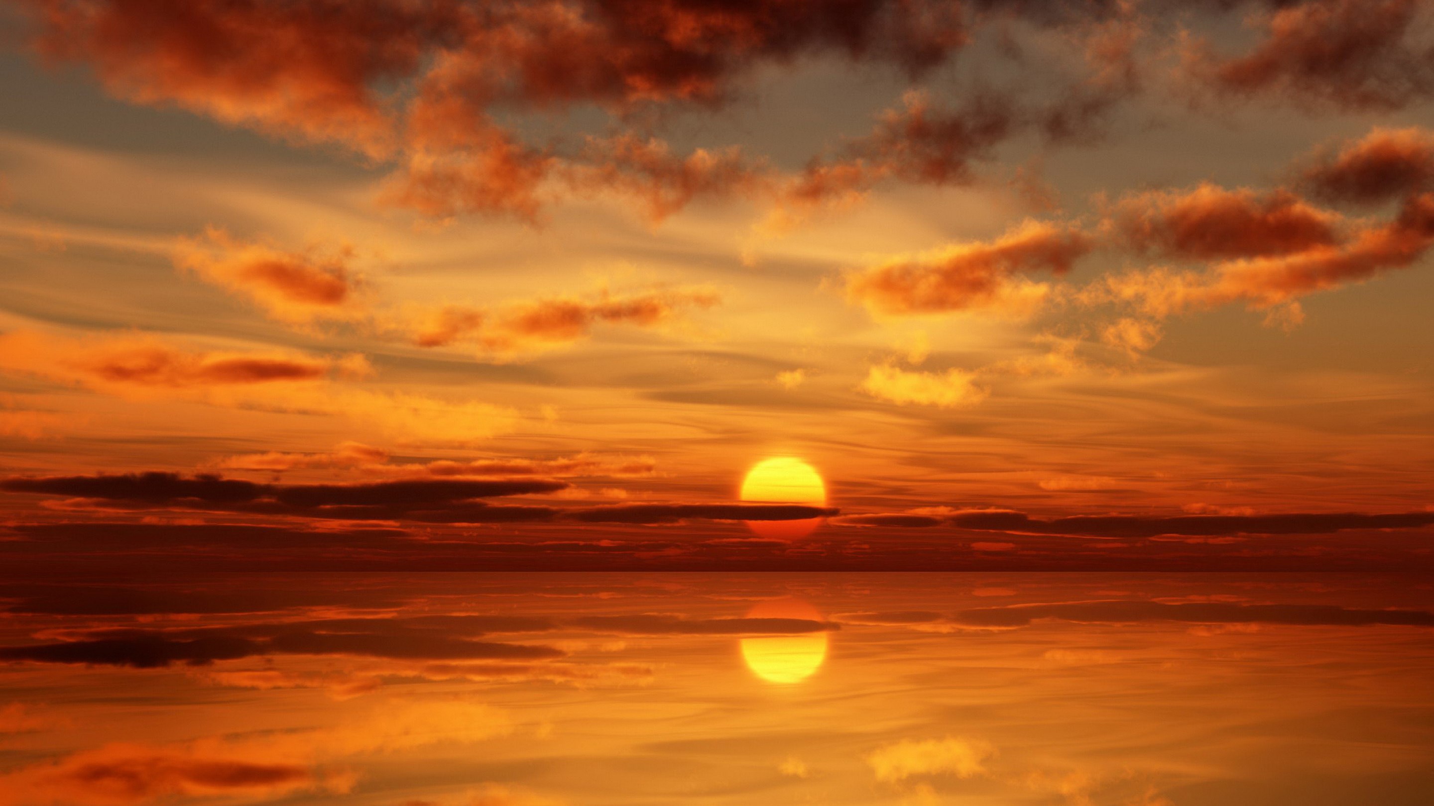 Sunset over the ocean with reflection HD Wallpaper