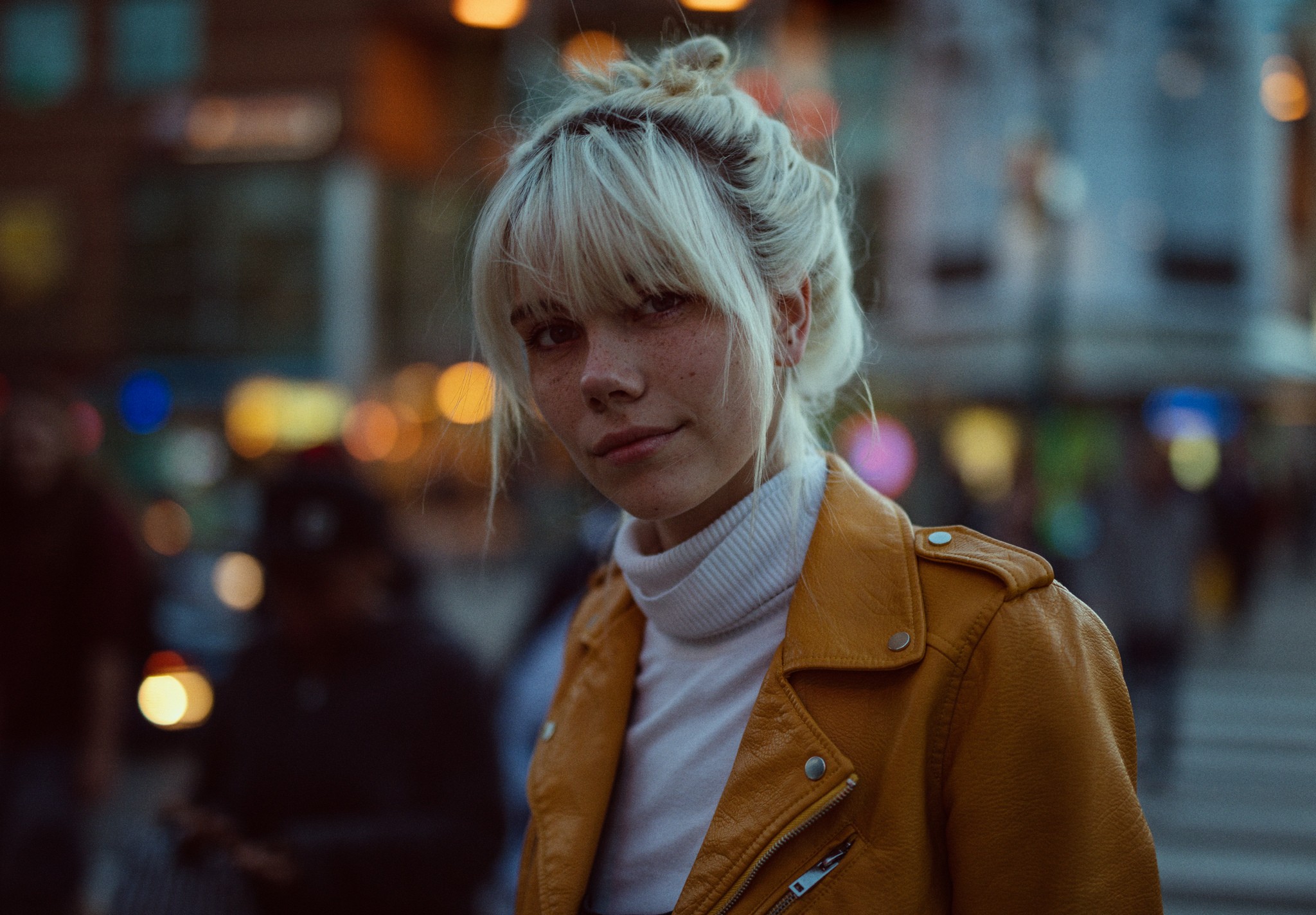 Portrait of a woman with blonde hair and freckles HD Wallpaper