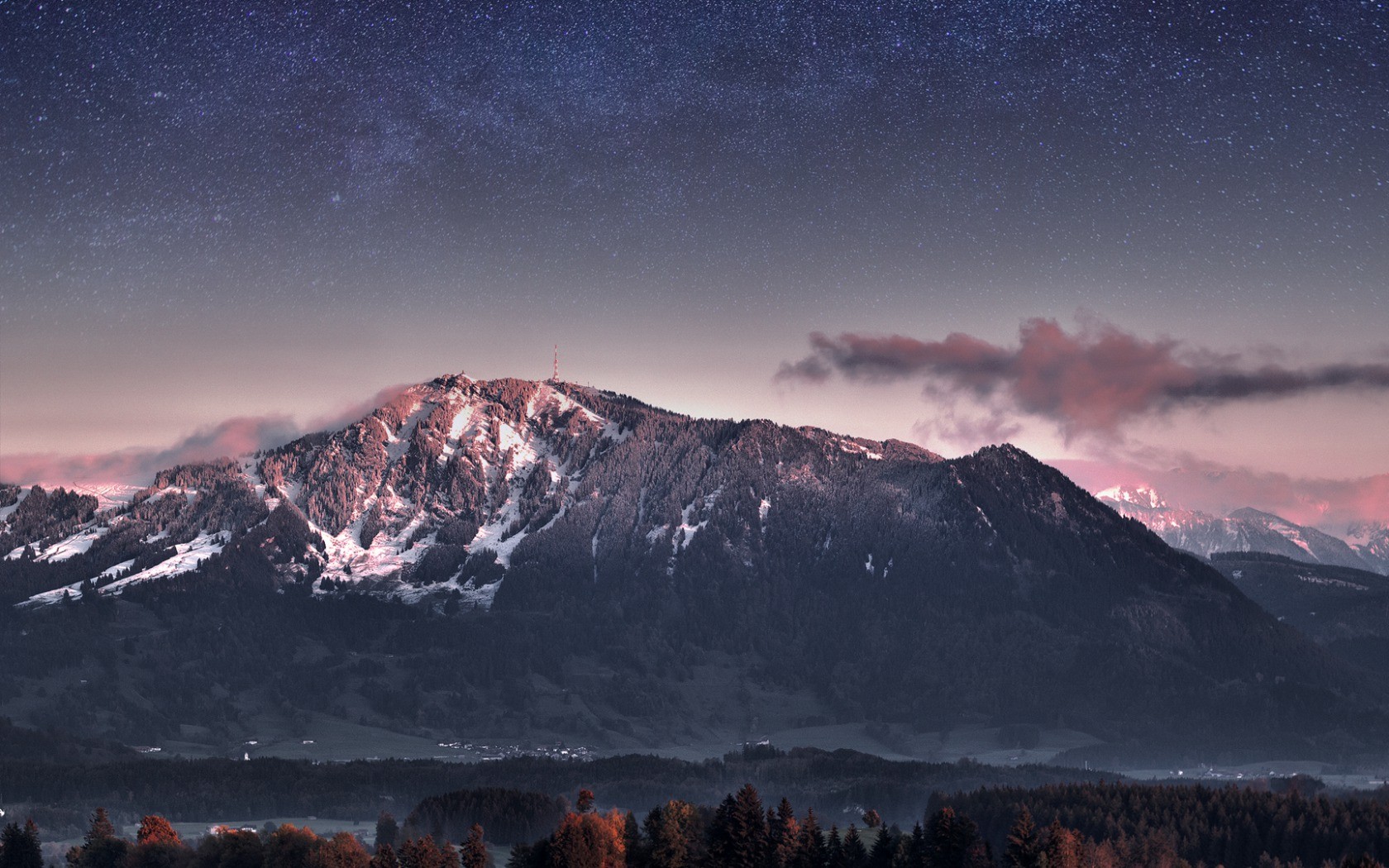 Snow-capped mountains under a starry sky HD Wallpaper