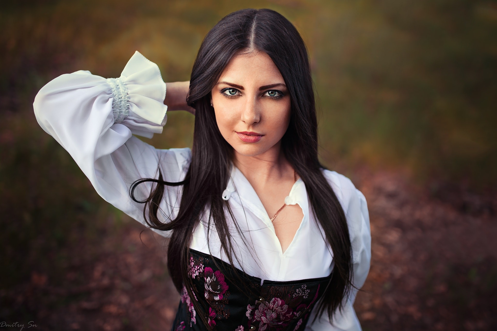 Woman with dark hair in a white shirt and corset outdoors HD Wallpaper