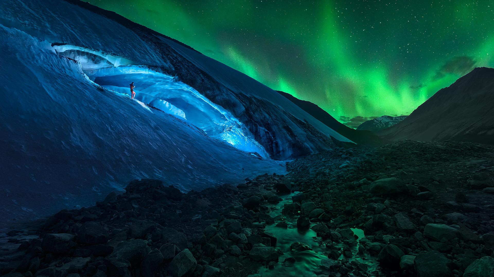 Person in Ice Cave Under Aurora Borealis HD Wallpaper