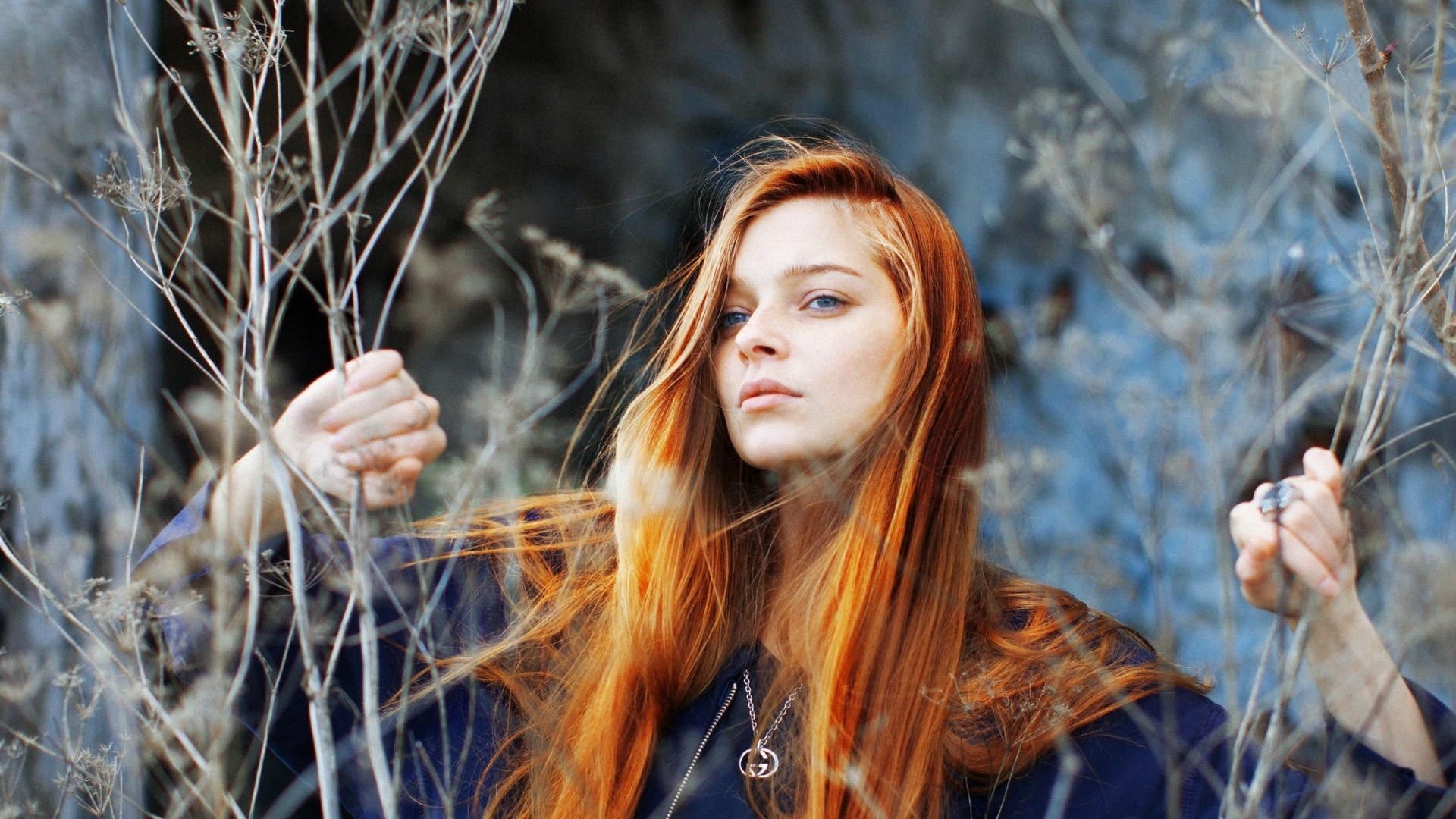 Redhead woman with blue eyes in dry plants HD Wallpaper