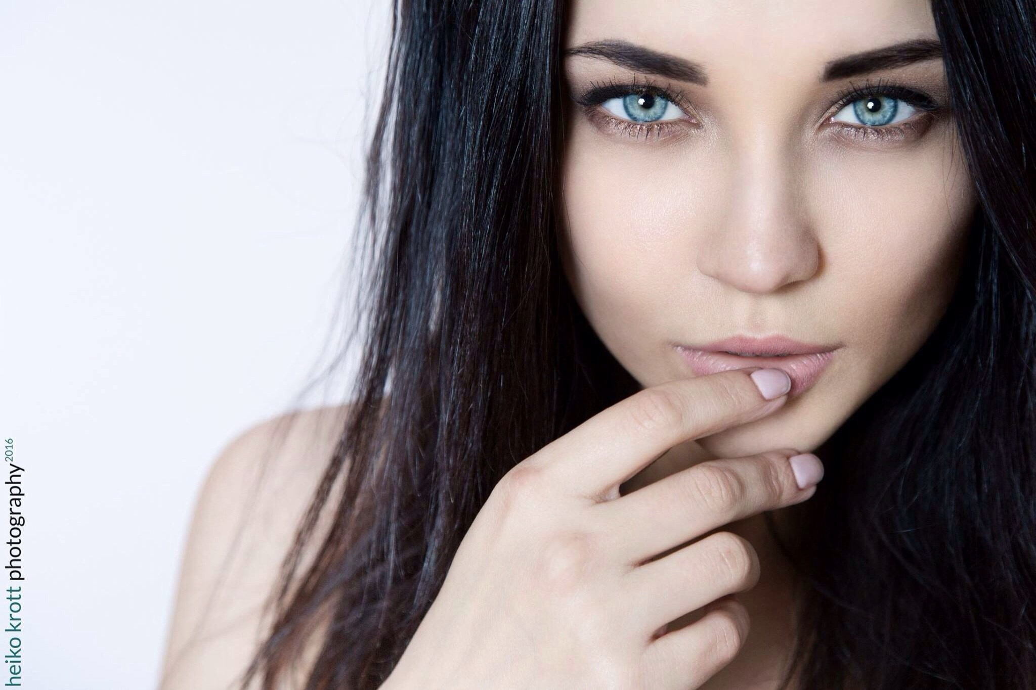 Angelina Petrova with finger on lips HD Wallpaper